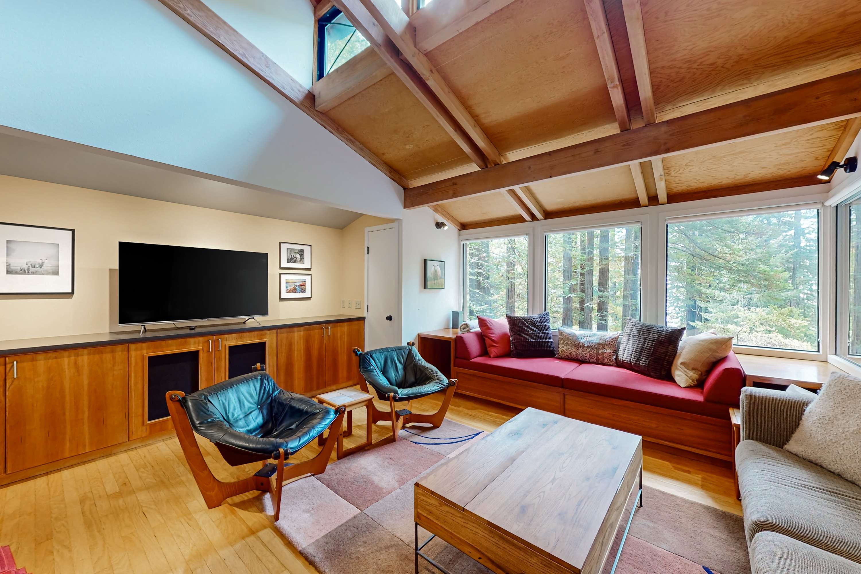 Imagine cozy evenings in this inviting living area, where laughter and stories flow as freely as the light through the windows.