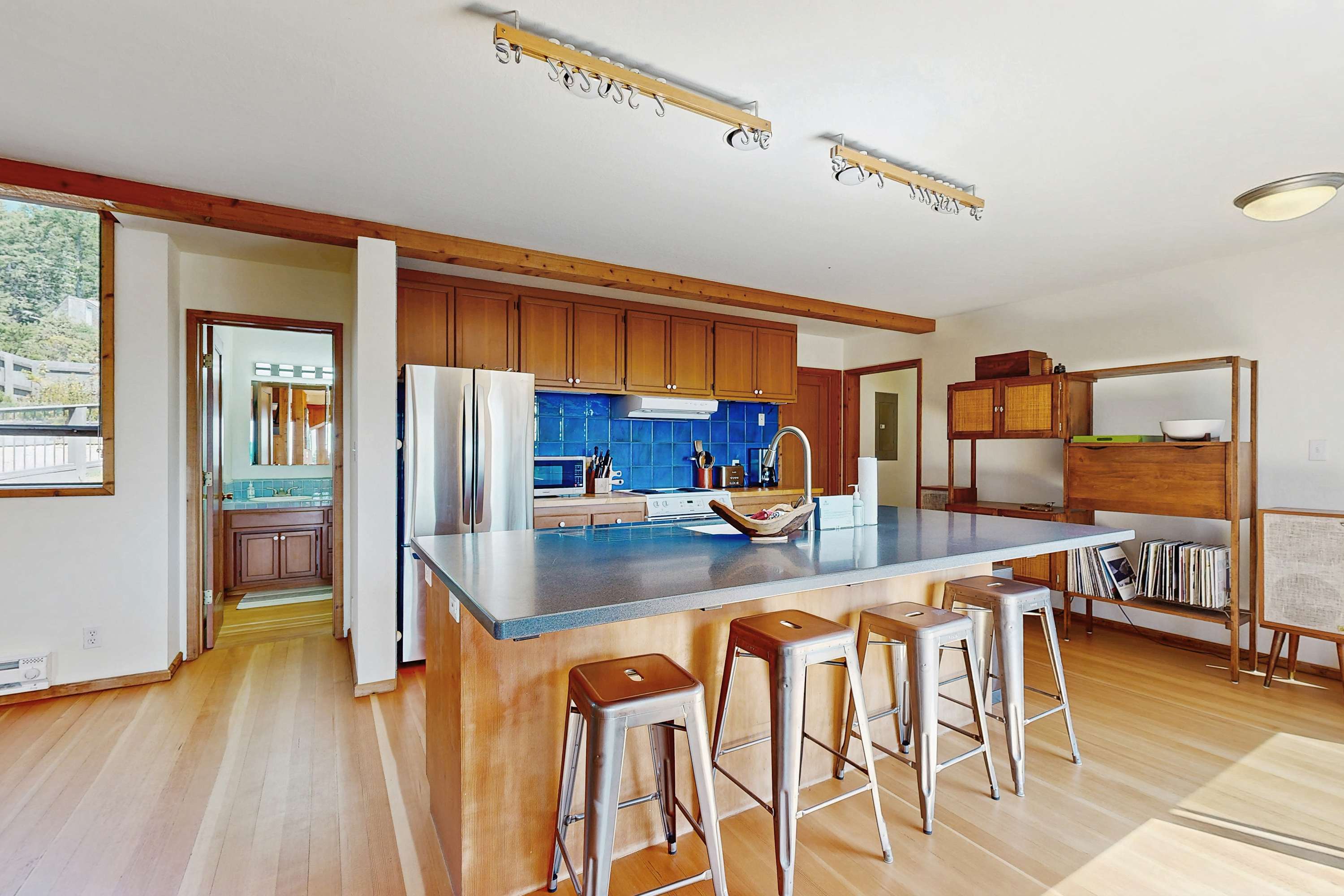 Cook with joy in this well-equipped kitchen, designed for culinary adventures while keeping you connected to family and friends.