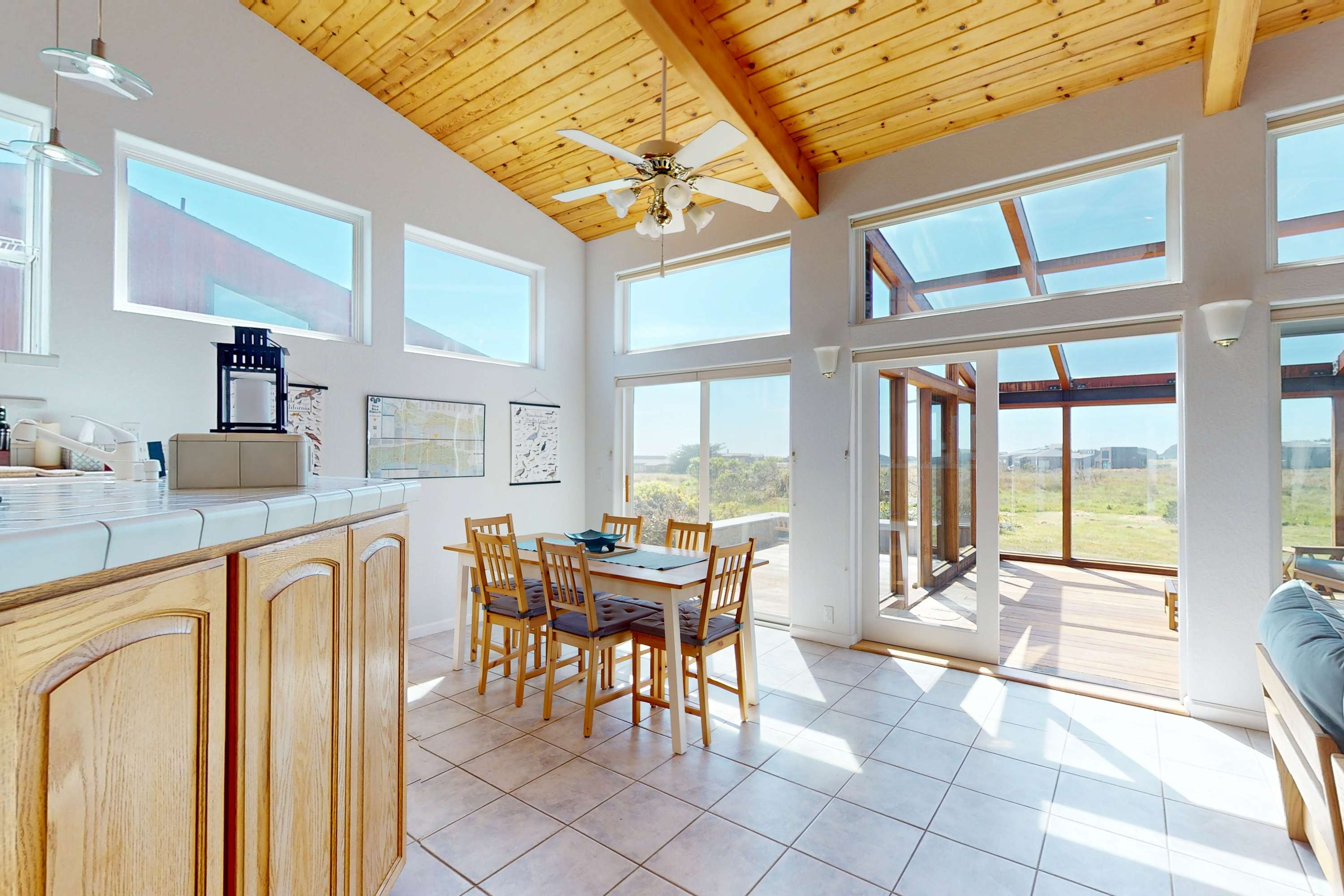 Dine with a view—enjoy meals bathed in sunlight in the inviting dining area, connecting you to the outdoor beauty.