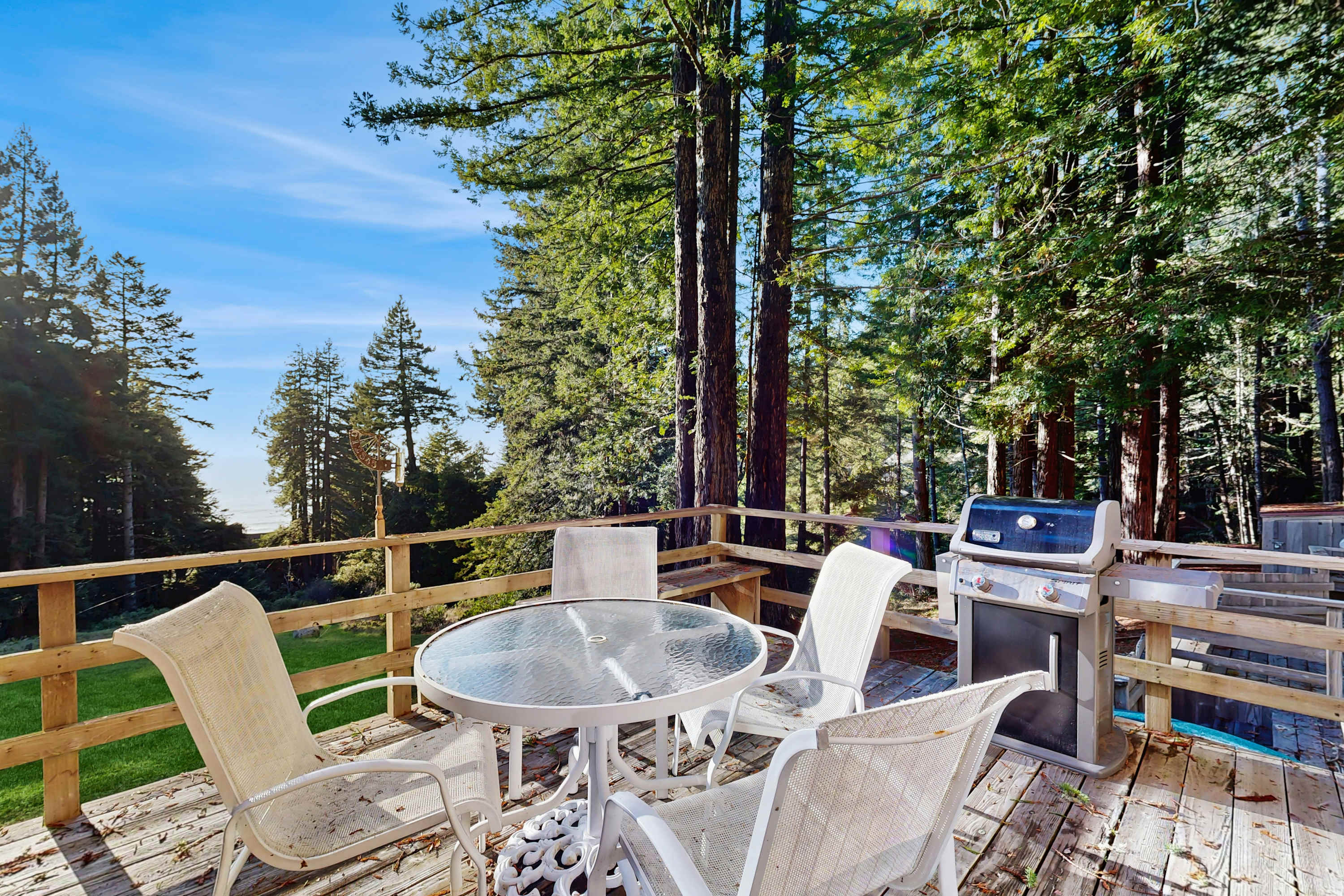 Host barbecues or simply soak in the sun on this spacious deck, offering a seamless blend of indoor and outdoor living.