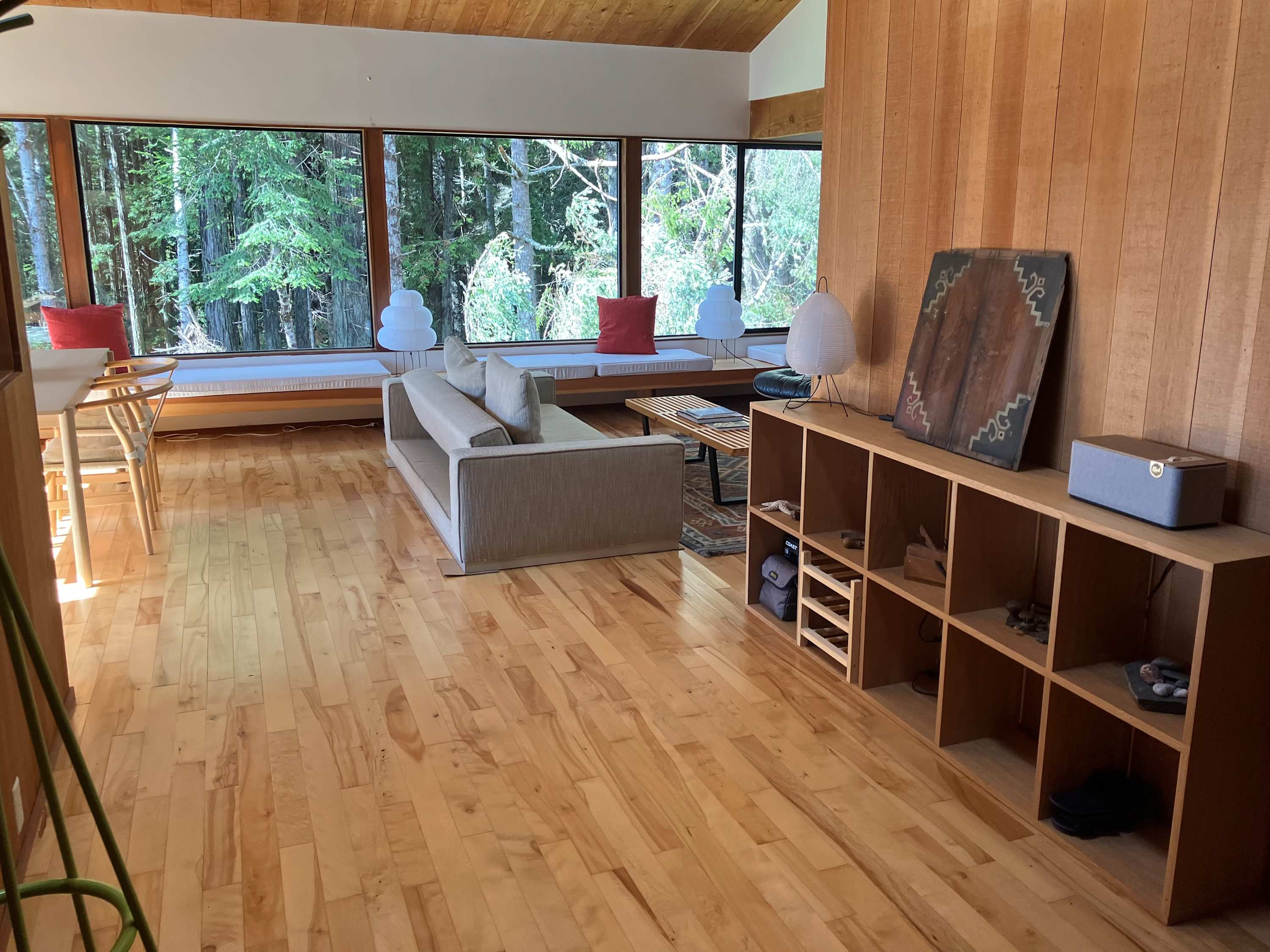 Experience open spaces in the living room, designed for relaxation and conversation, with views that bring the outdoors in.
