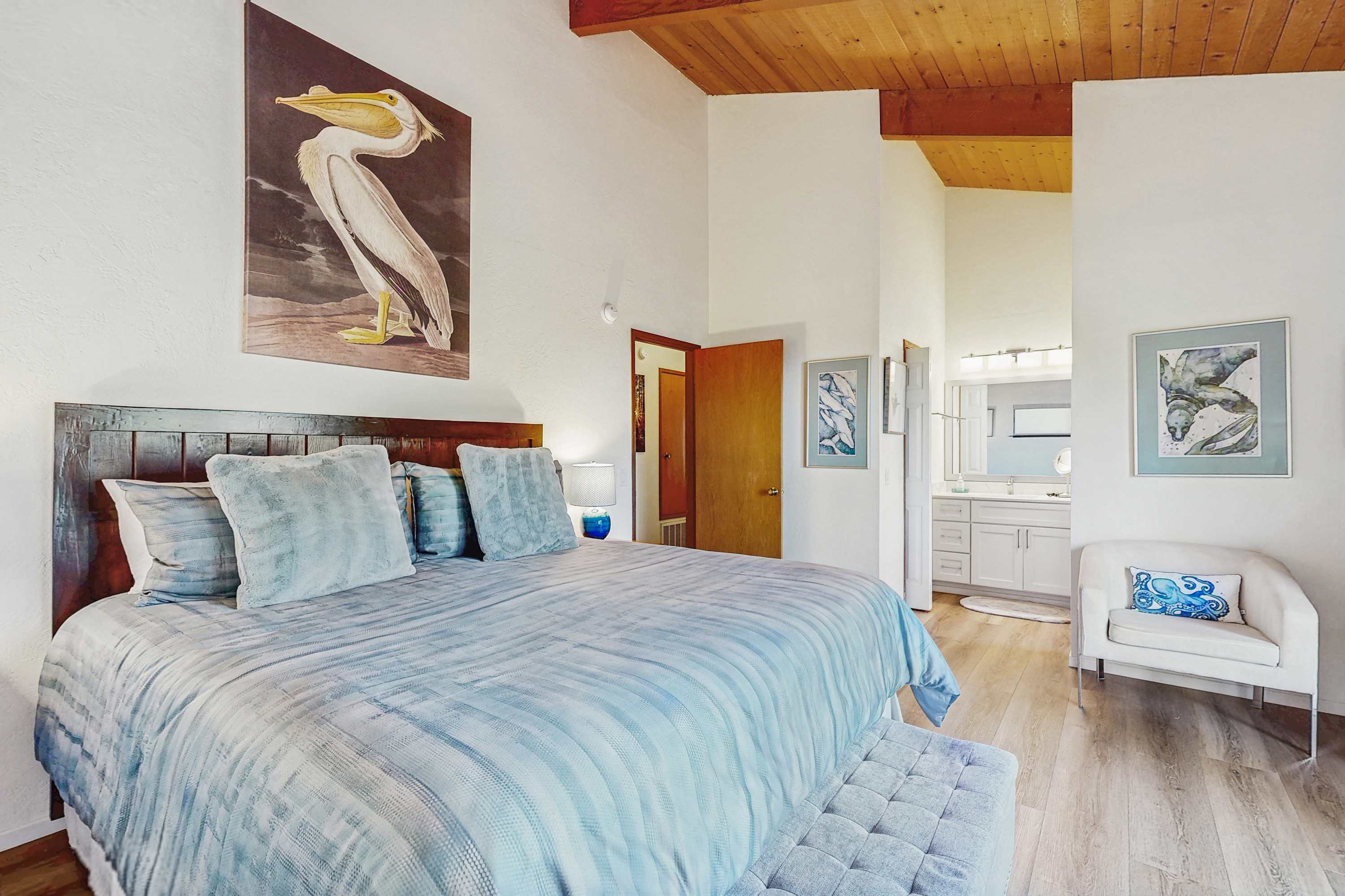 Retreat to the master bedroom, where a tranquil atmosphere and plush bedding promise restful nights and rejuvenating mornings.