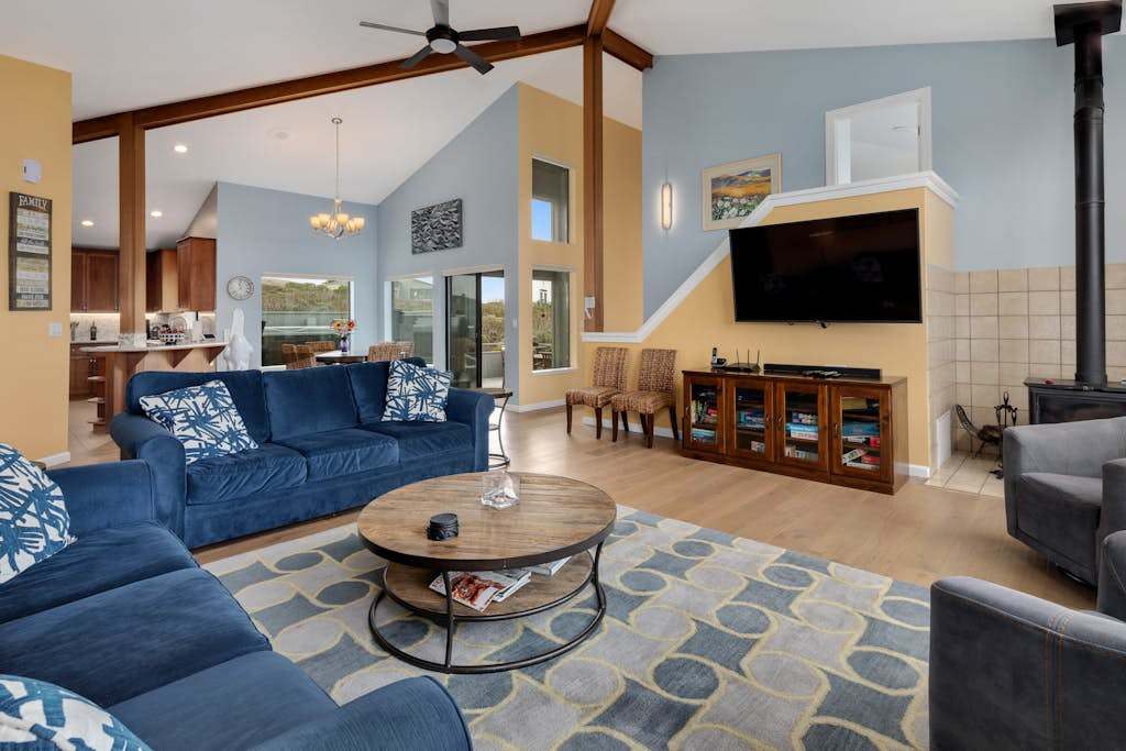 Gather around the wood-burning stove on cool coastal evenings while your favorite film plays on the big screen.
