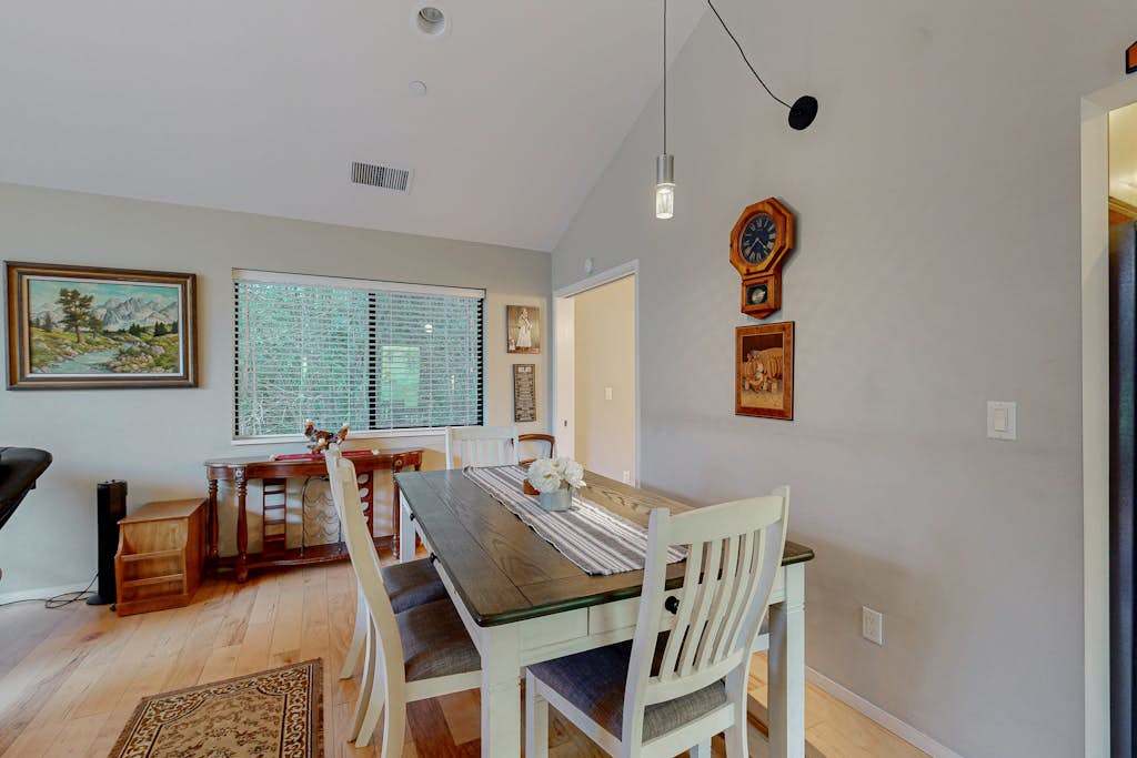 Enjoy farm-to-table meals at the elegant dining table, perfectly positioned for your wine country dinner party.