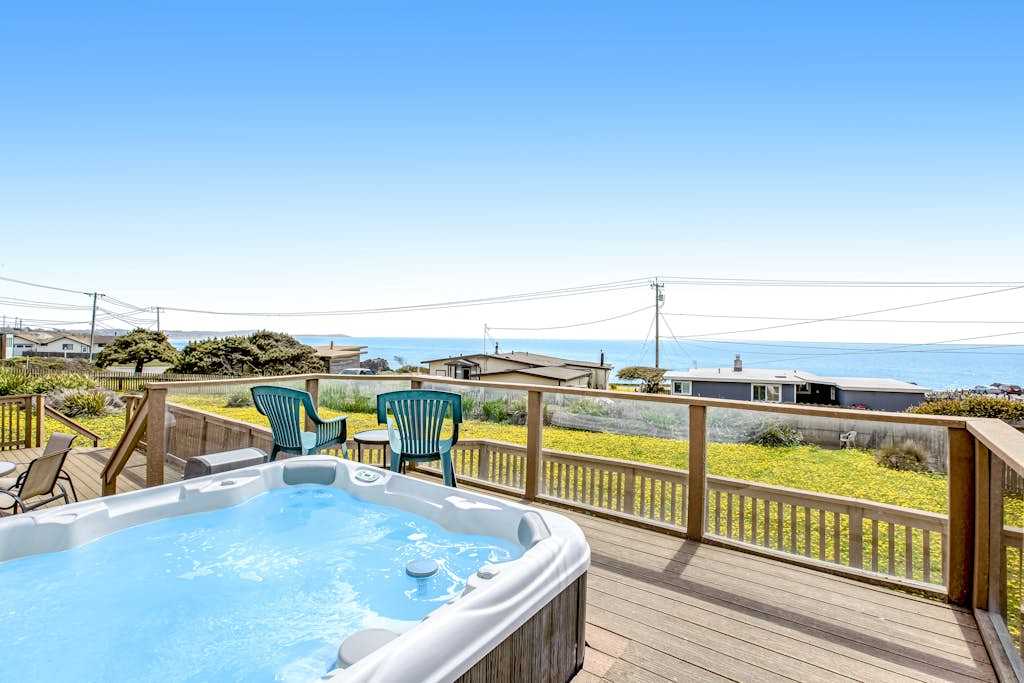 Bubbling hot tub and sweeping Pacific views make this deck your favorite spot for Sonoma Coast mornings and evenings alike.
