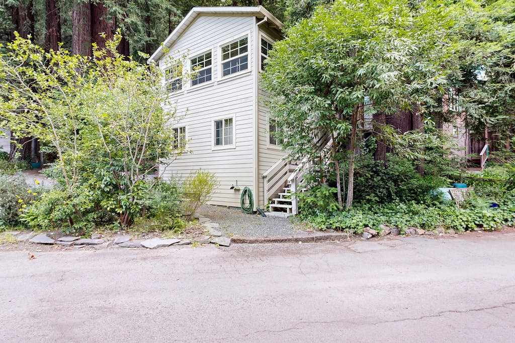 Nestled among towering redwoods, your Guerneville cottage awaits with classic wine country charm and a private wooded setting.