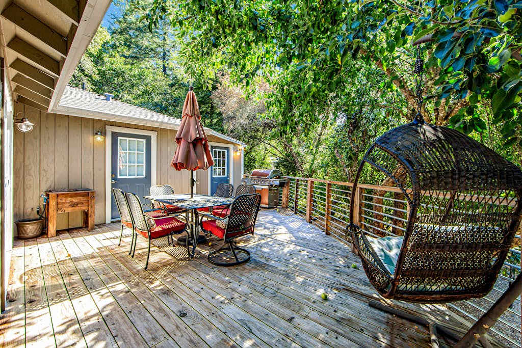 Lounge in the hanging egg chair or gather at the outdoor table — this deck was made for lazy wine country afternoons