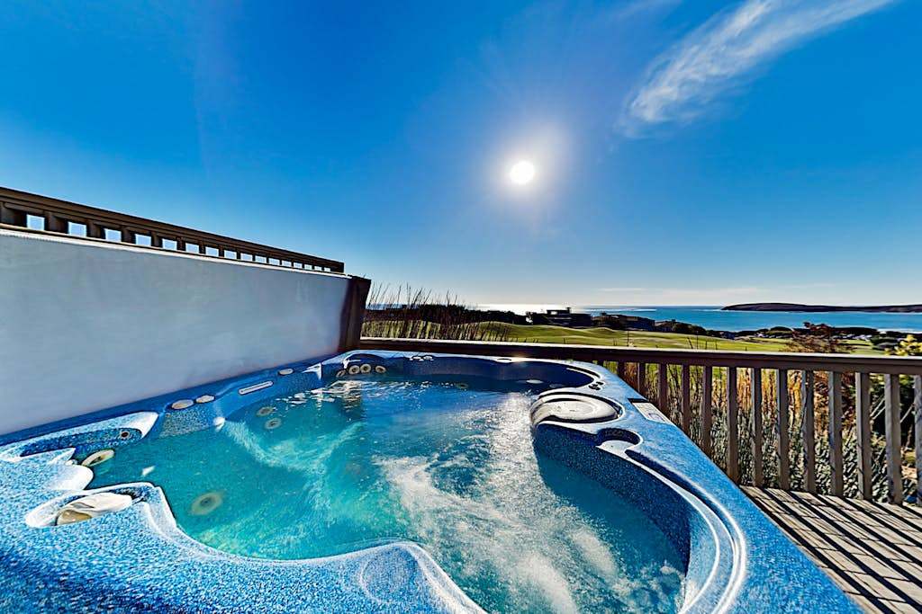 Soak in your private hot tub perched above the Sonoma Coast — nothing between you and the Pacific horizon but fresh salt air and golden light.