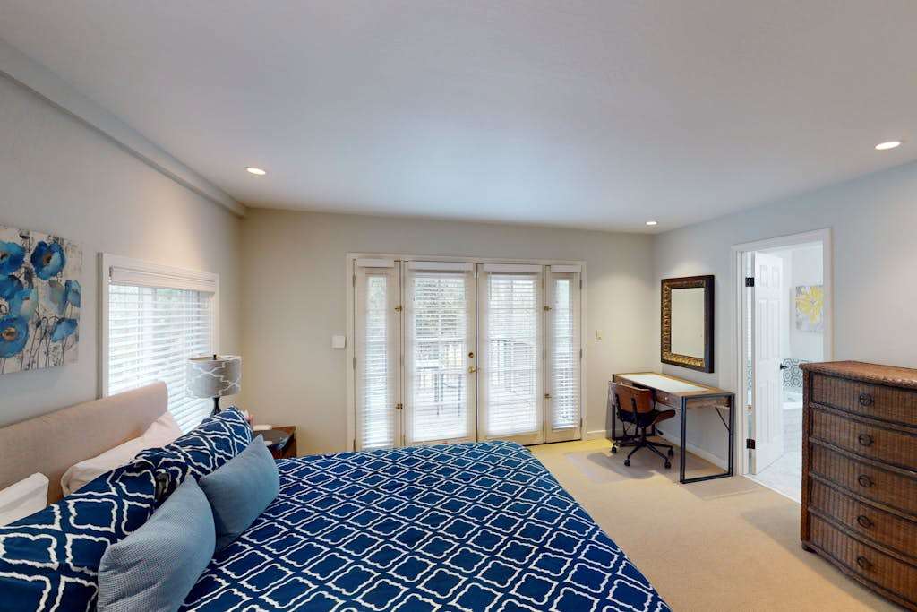 Retreat to your serene master suite with a plush king bed and French doors opening to the patio — fall asleep to the quiet sounds of Glen Ellen.