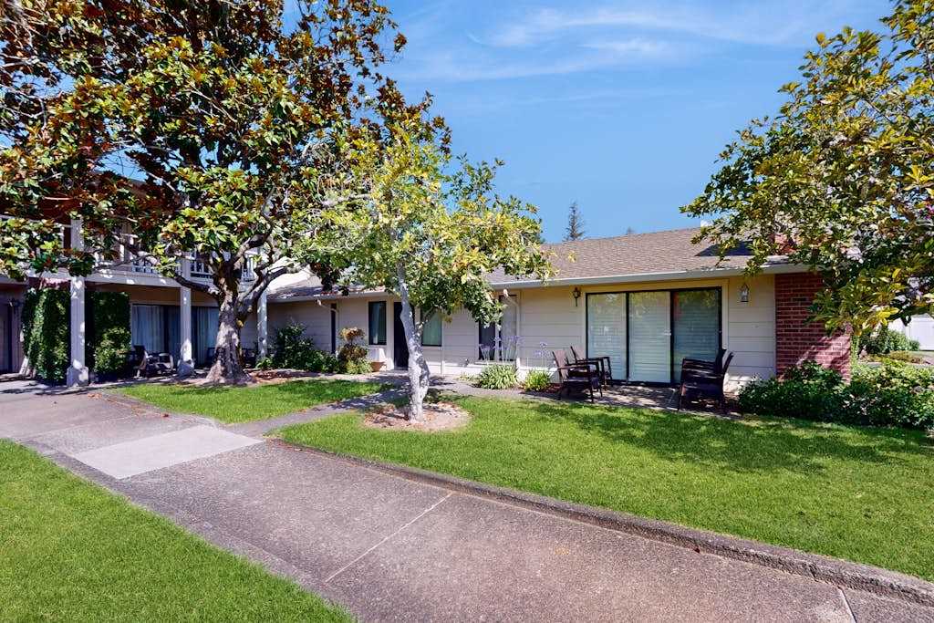 Welcome to your Napa Valley retreat at Silverado Resort — a charming single-story suite surrounded by manicured lawns and mature shade trees