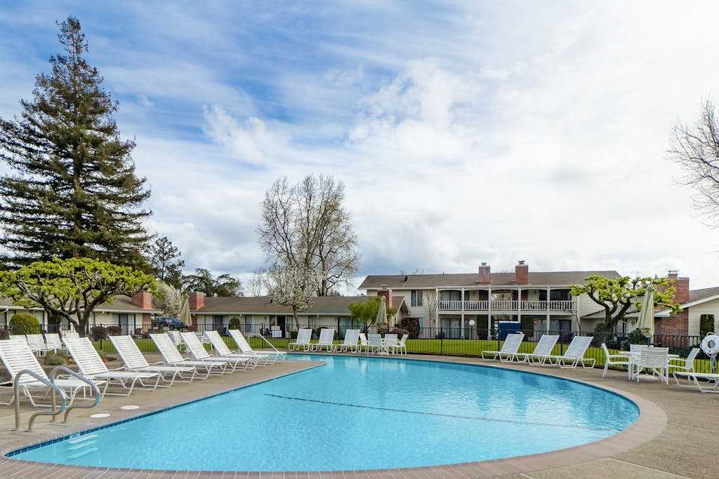 Cool off in the sparkling resort pool after a warm Napa Valley afternoon — sun loungers line the deck so you can relax between laps and sips.