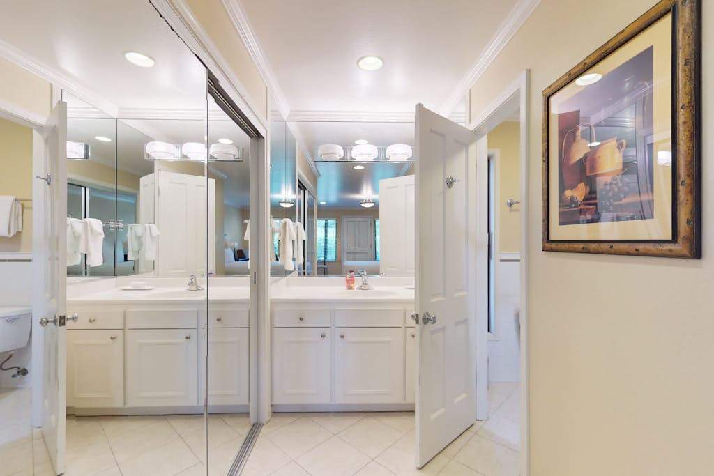 Freshen up in your bright, spacious bathroom — a generous vanity with full-length mirrors gives you plenty of room to get ready for a Napa Valley evening out.