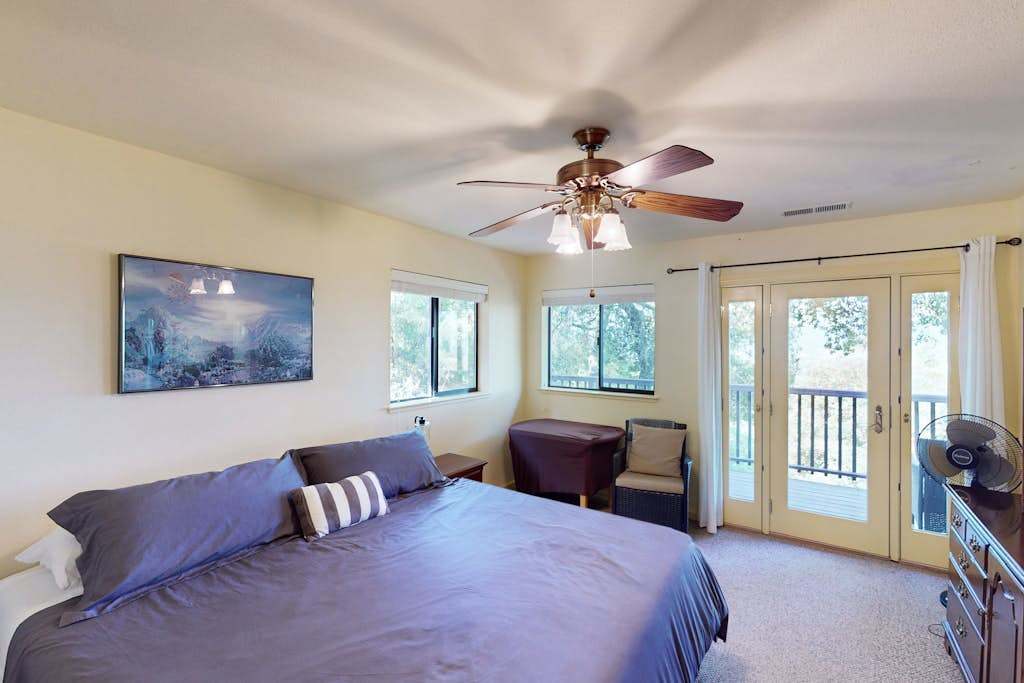 Retreat to your king-size sanctuary with French doors opening to a private balcony — fall asleep to the quiet sounds of Cloverdale's oak-studded hillsides.