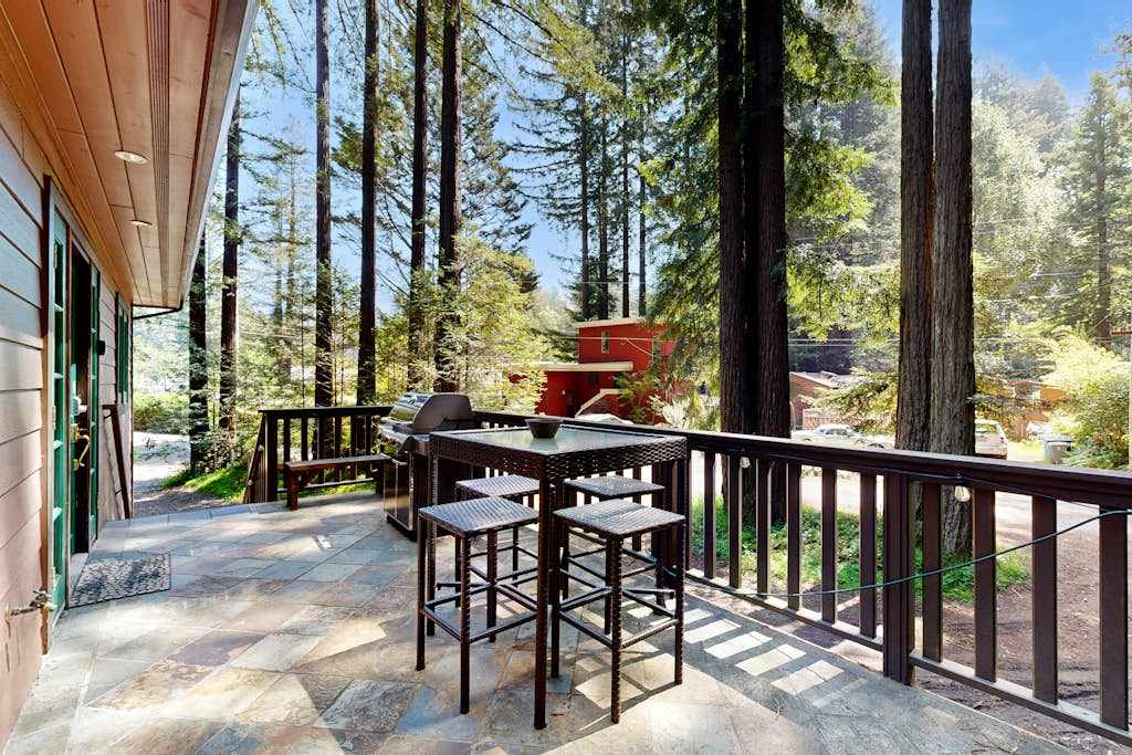 Gather around your high-top deck table for al fresco lunches with redwood canopy views — the BBQ grill stands ready for your Sonoma County farmers' market finds.