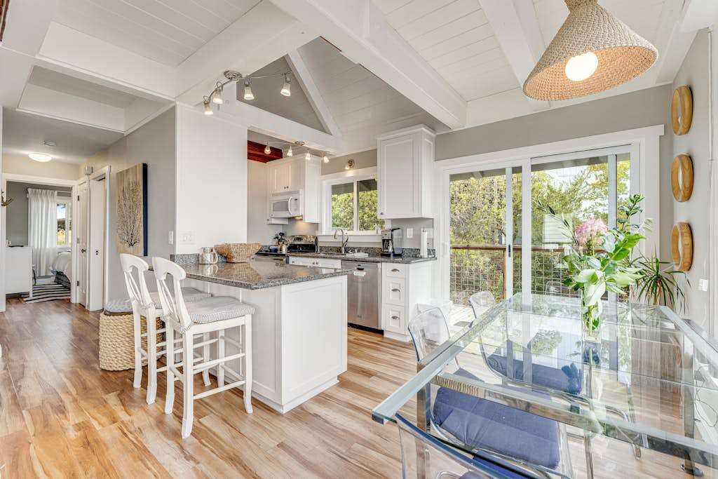 Cook like a local in your bright open kitchen with granite counters, breakfast bar seating, and vaulted ceilings that keep your Bodega Bay evenings airy.