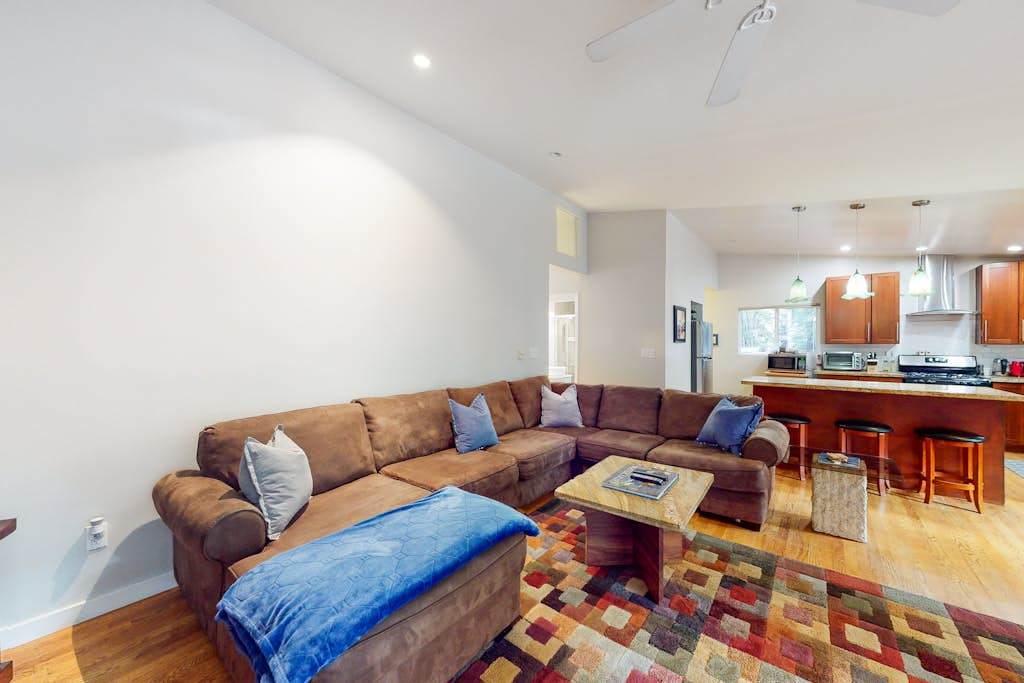 Gather your group in the open-concept living space — your kitchen and living room flow together so no one misses the conversation while you uncork a Sonoma County Pinot.