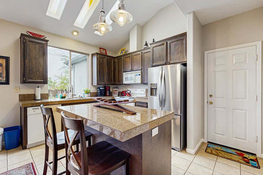 Brew your morning cup in a fully equipped kitchen with granite countertops, a breakfast bar, and stainless steel appliances — everything you need to cook with local Sonoma ingredients.