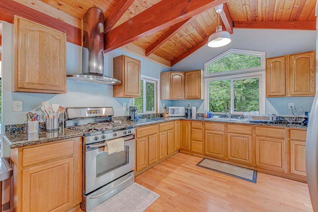 Channel your inner chef in this fully equipped kitchen with granite counters, a gas range, and stainless hood — ready for your Sonoma farmers market haul.