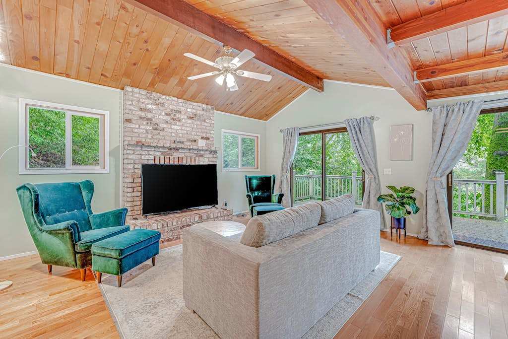 Settle into your vaulted great room where warm wood ceilings, a brick hearth, and plush seating make the perfect spot to recap your Sonoma tasting adventures.