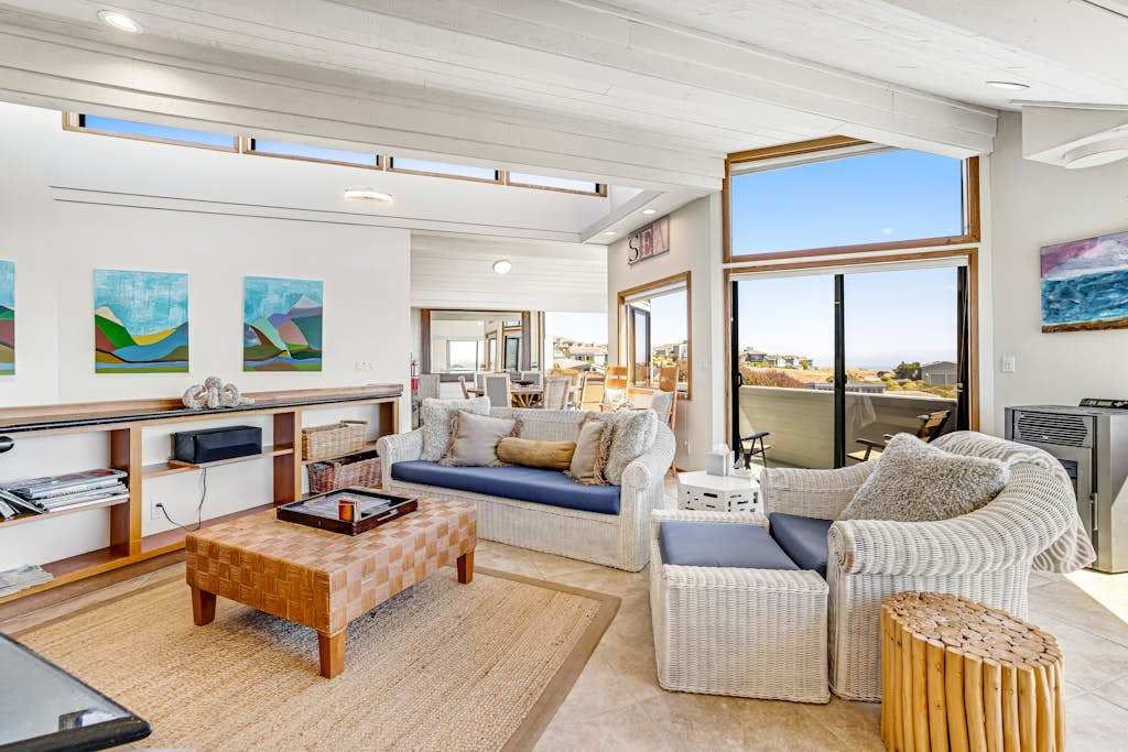 Curl up on the window seat with a Sonoma County wine and watch fishing boats drift across the bay from your living room perch