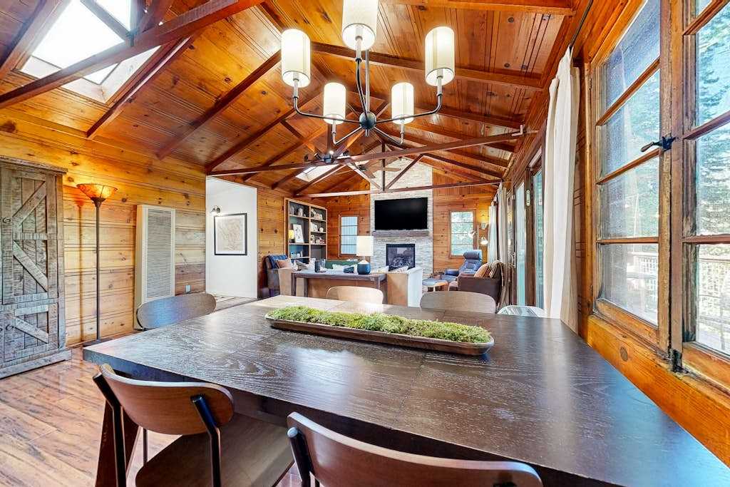 Host a wine-country dinner for six at the handsome wood table — open sightlines to the living room keep everyone connected.