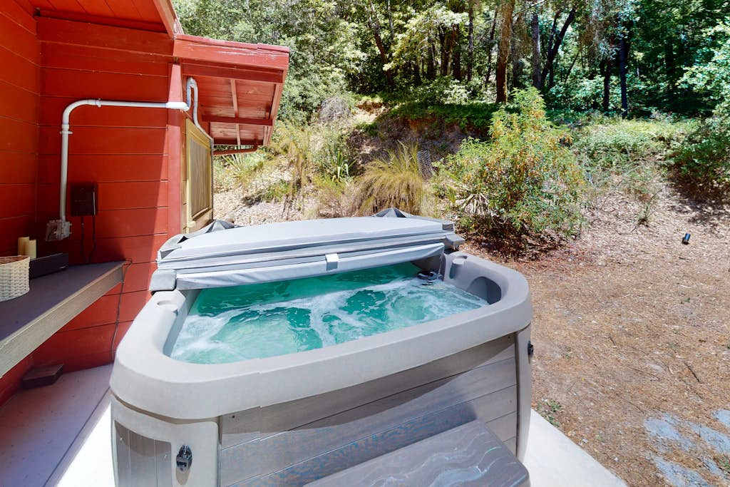 Ease into your private hot tub tucked among the redwoods — let the forest sounds wash over you after a day exploring Russian River wine country.
