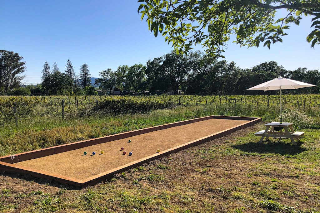 Challenge your group to a round of bocce on your private vineyard-side court — cold glass of Healdsburg wine in hand, rolling hills beyond.