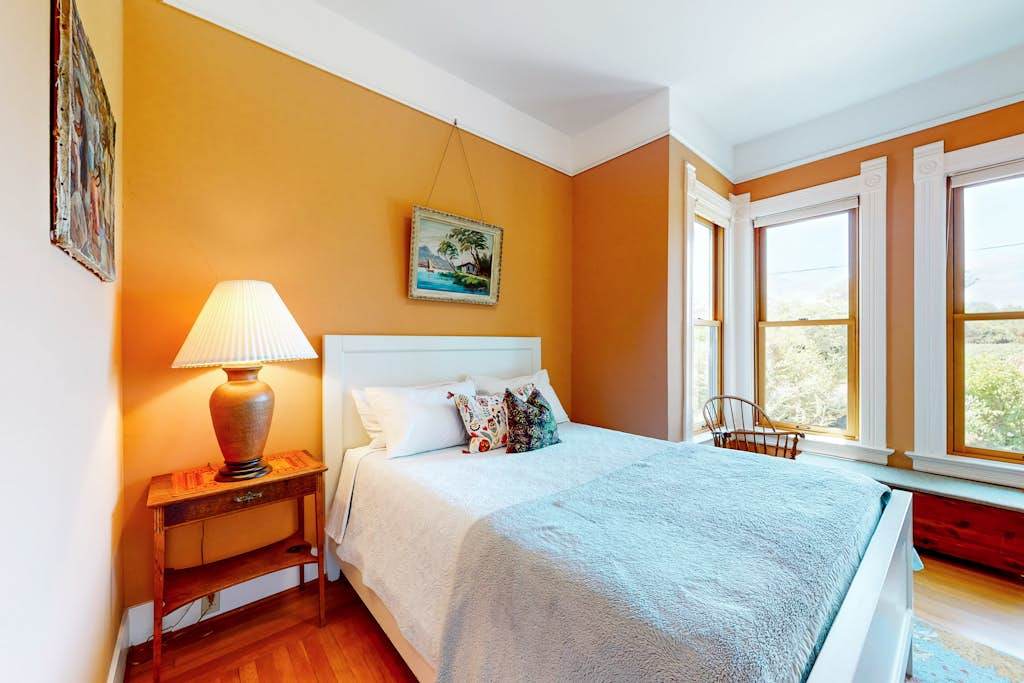Nestle into plush pillows as afternoon light pours through your bedroom windows — a restful retreat after a day on the Healdsburg wine trail.