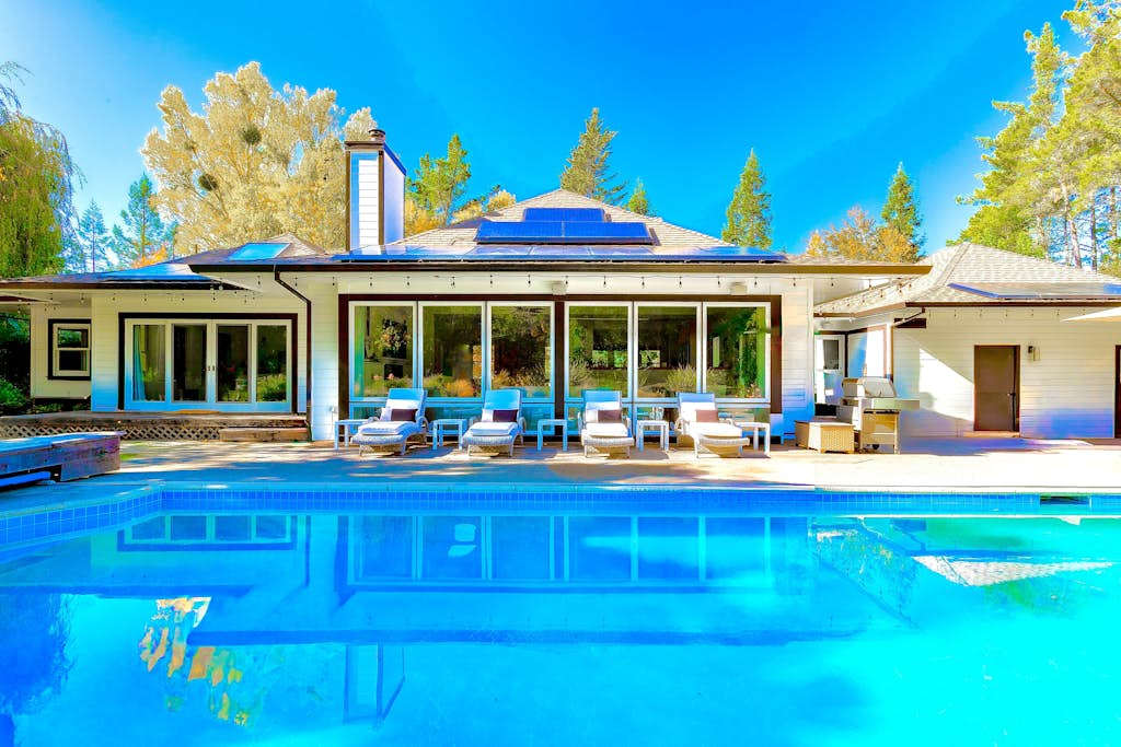 Dive into your private Sebastopol retreat — a sun-drenched heated pool flanked by loungers invites you to unwind between wine country tastings