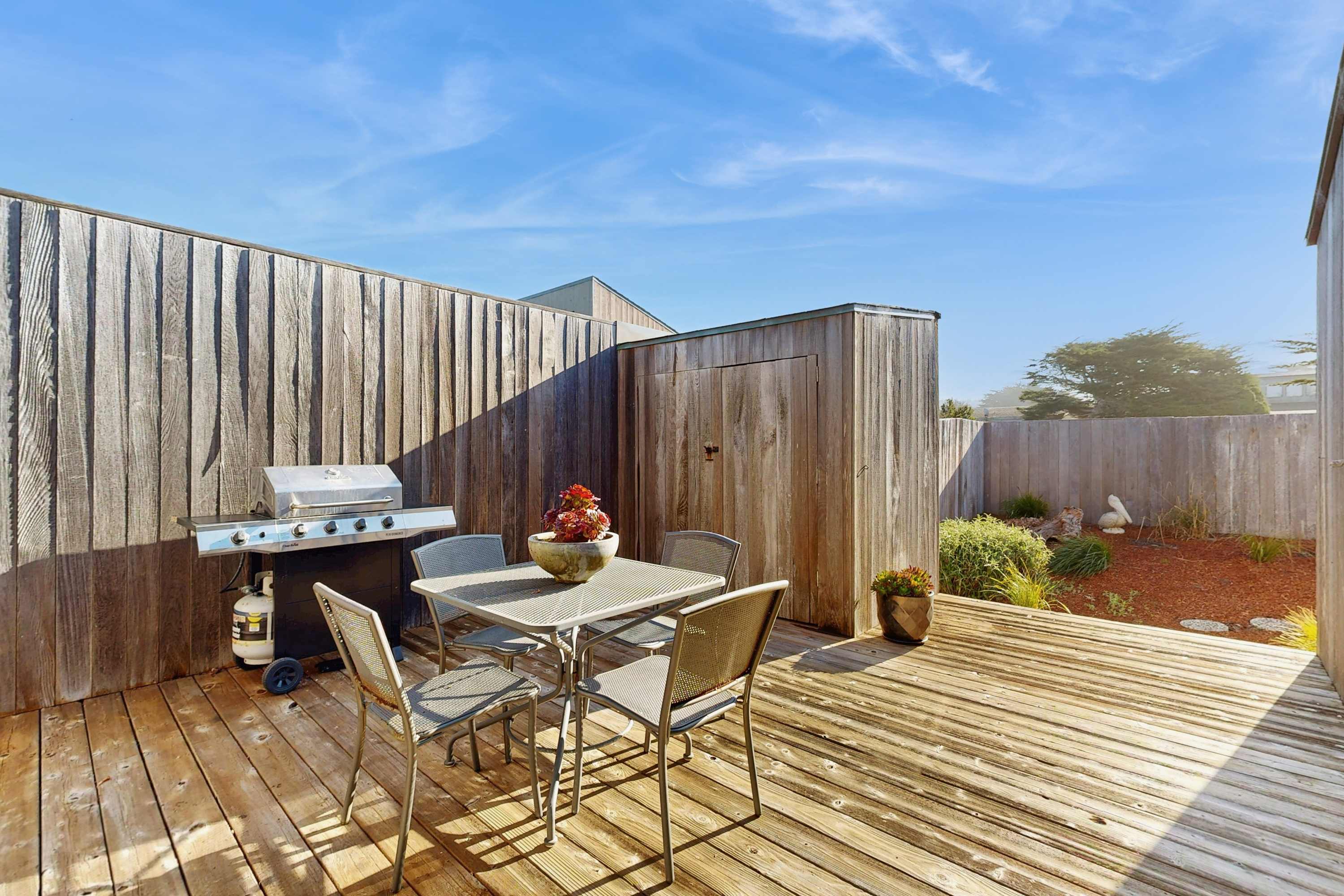 Fire up the gas grill and dine al fresco in the private fenced courtyard, sheltered from the coastal breeze and surrounded by native plantings.