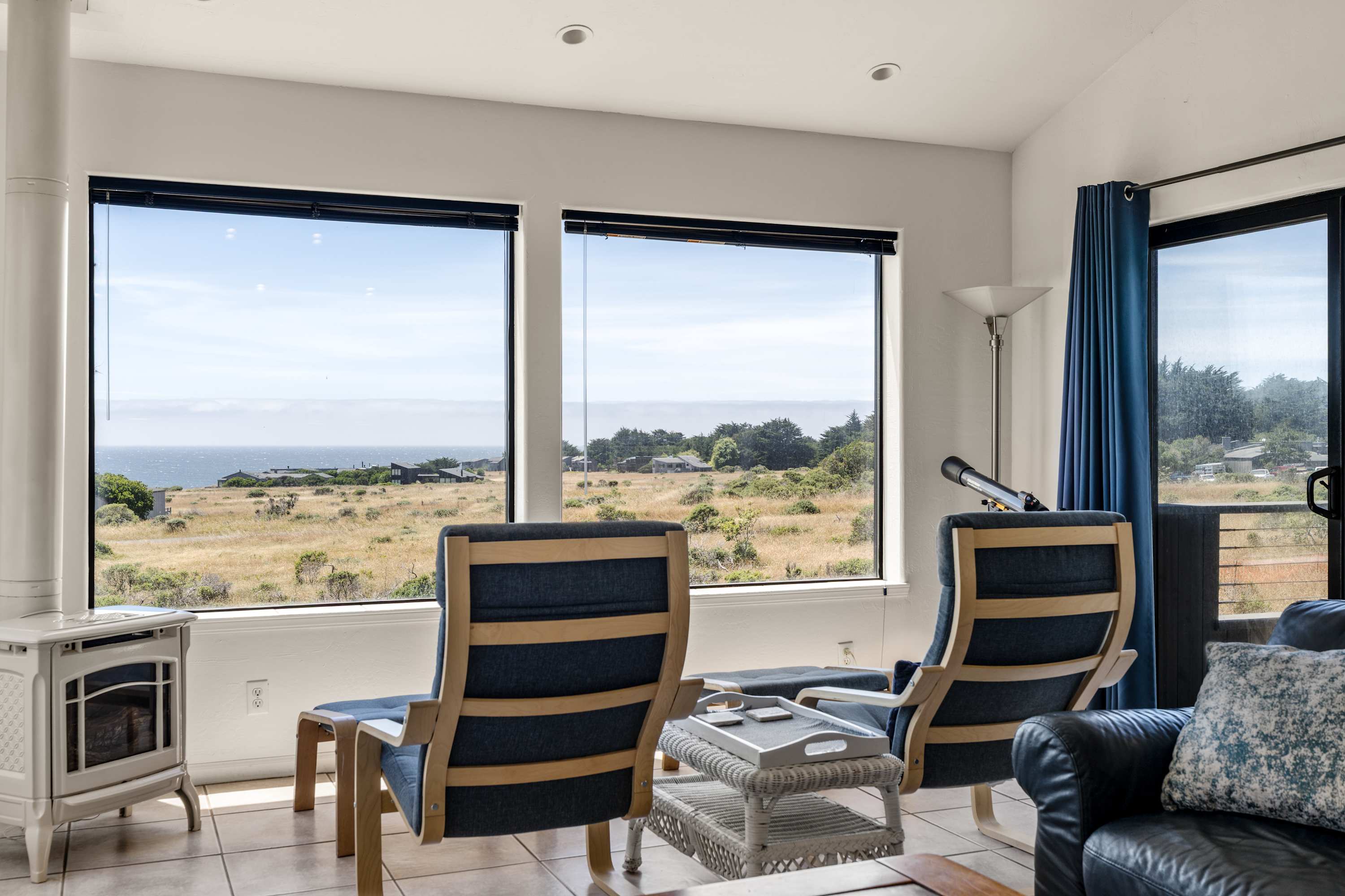 Sink into a blue armchair and watch the Pacific shimmer beyond the coastal meadow, with a telescope on hand for spotting whales and passing ships.