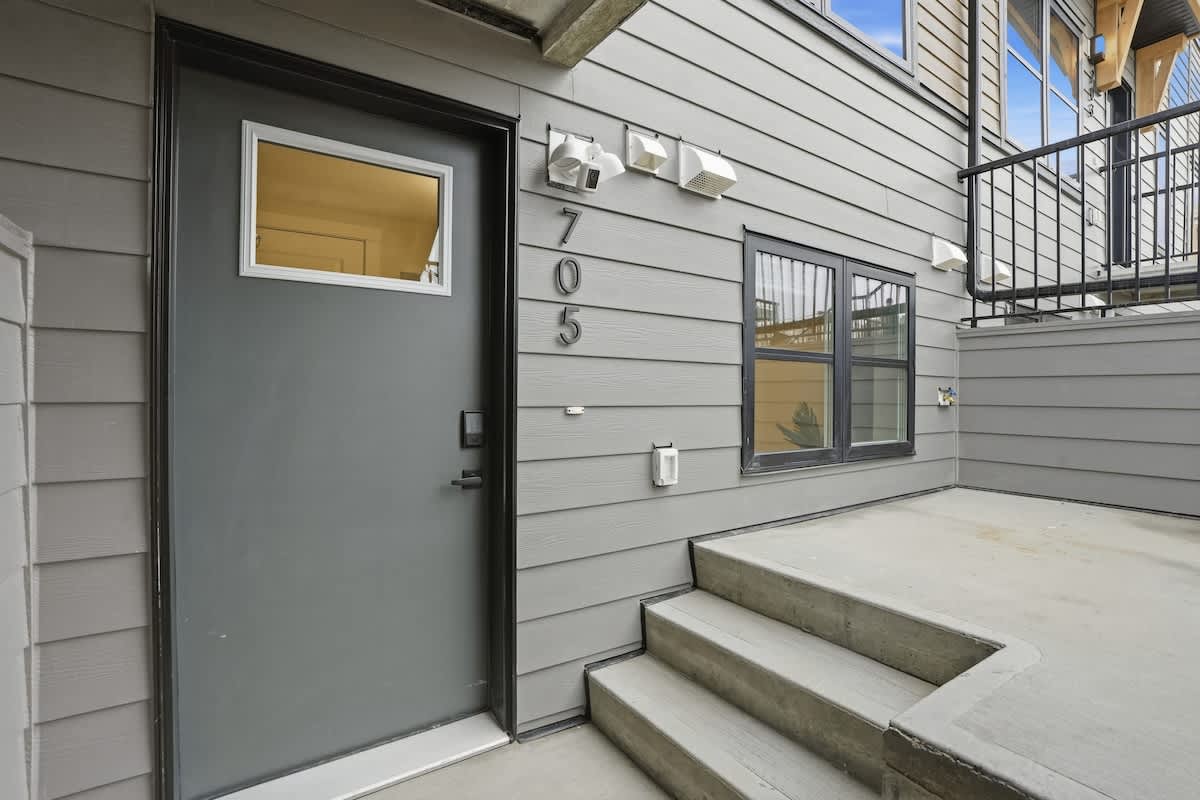 Entrance to unit 705, lower level with patio area