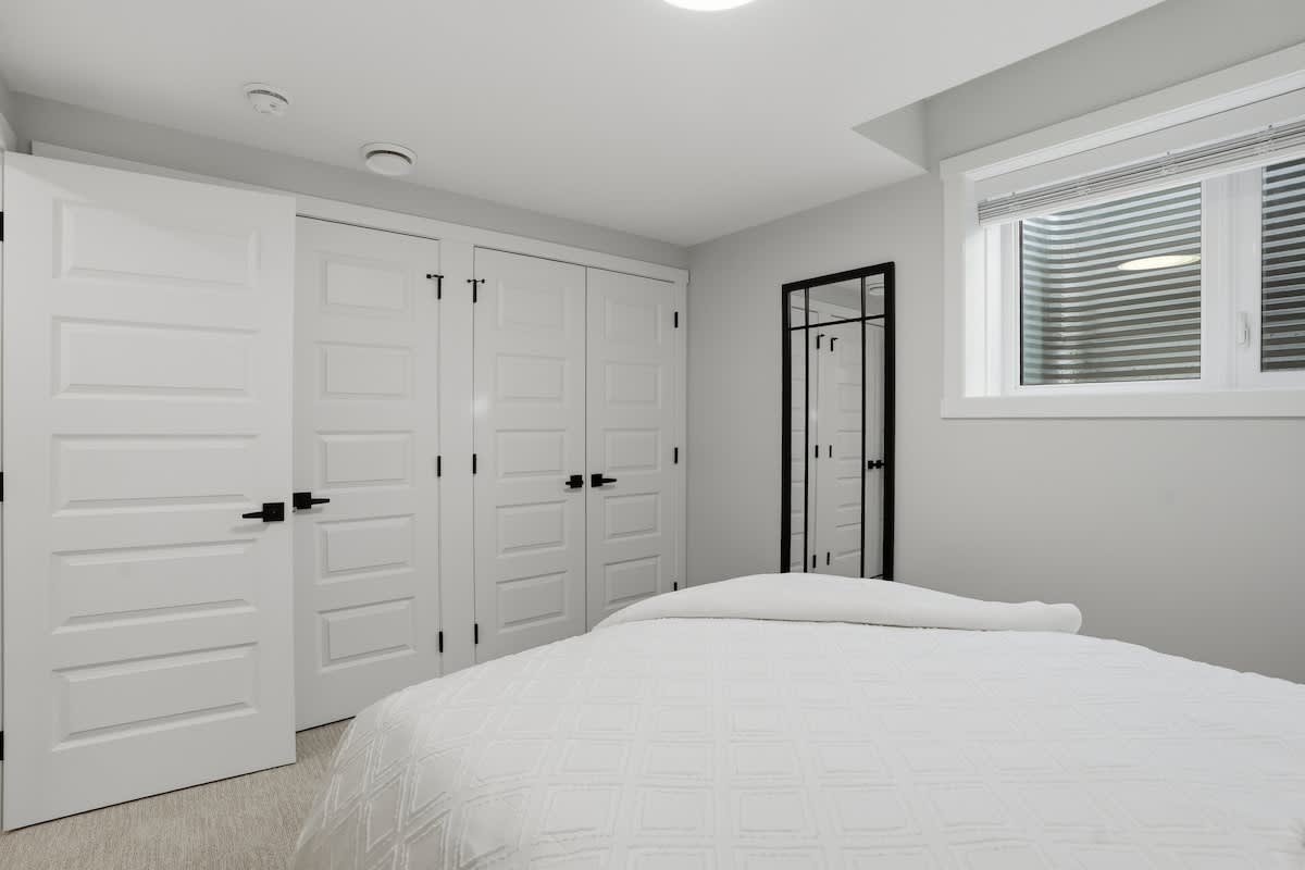 Dual closets with ample storage.