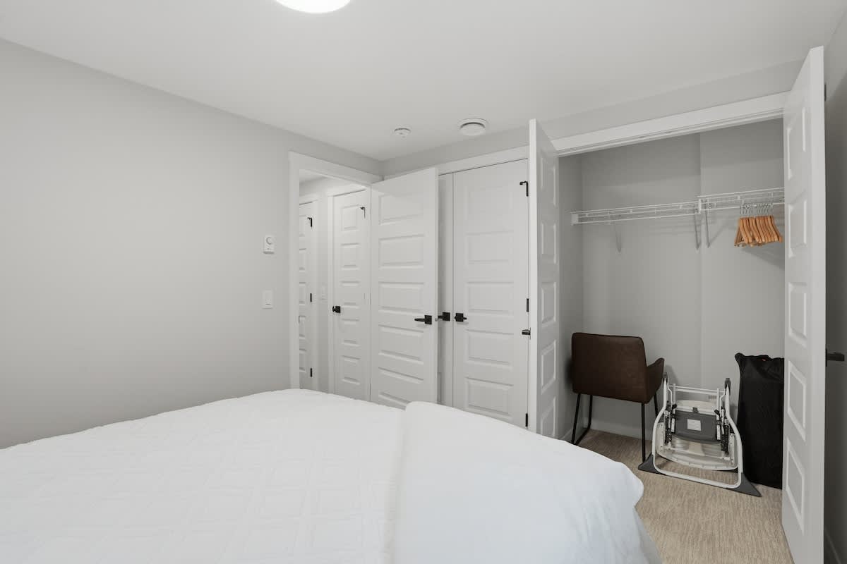 Closet contains Pack 'n Play crib and high chair
