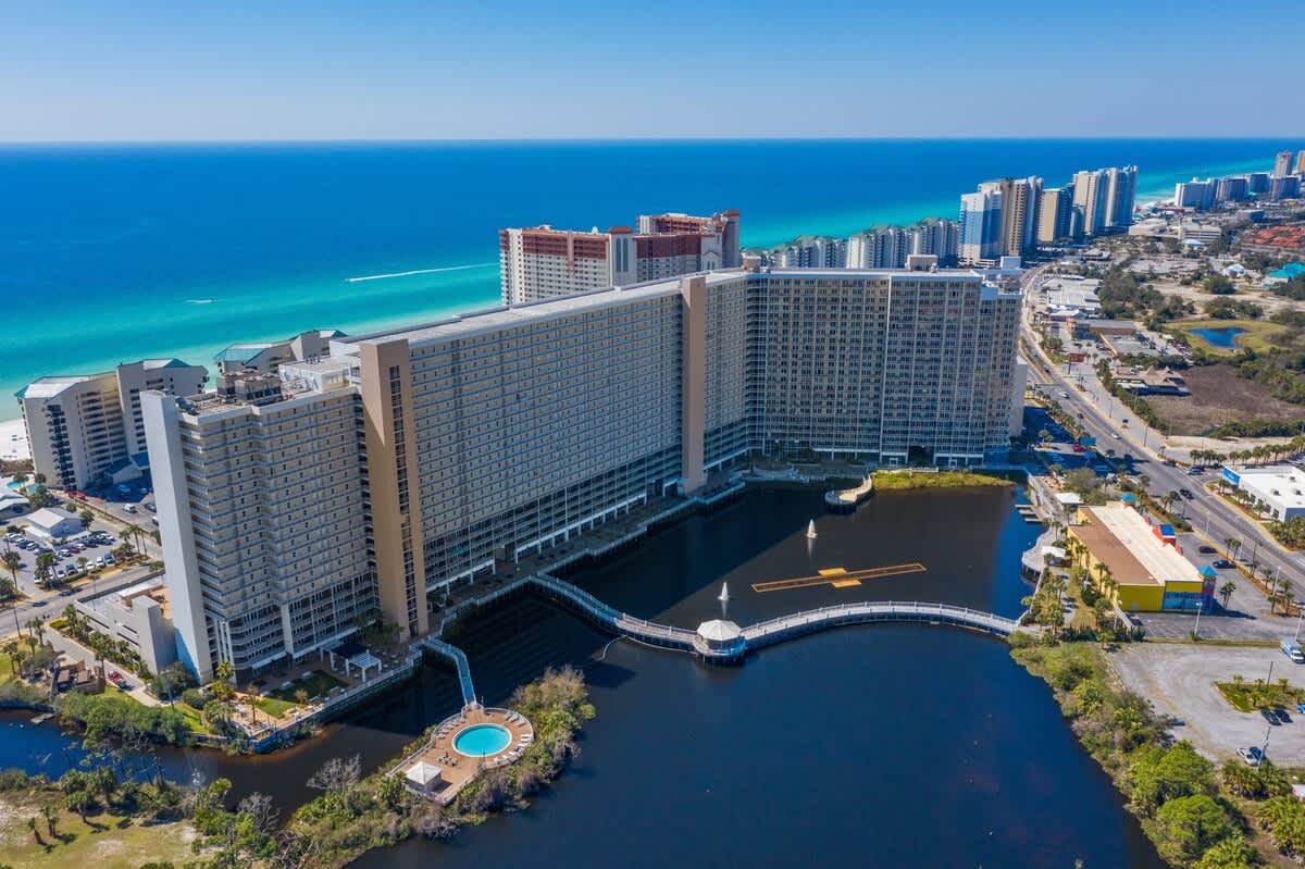 Laketown Wharf 1331 – Aerial view of Laketown Wharf 1331, highlighting the building, lagoon, and nearby beach and ocean.
