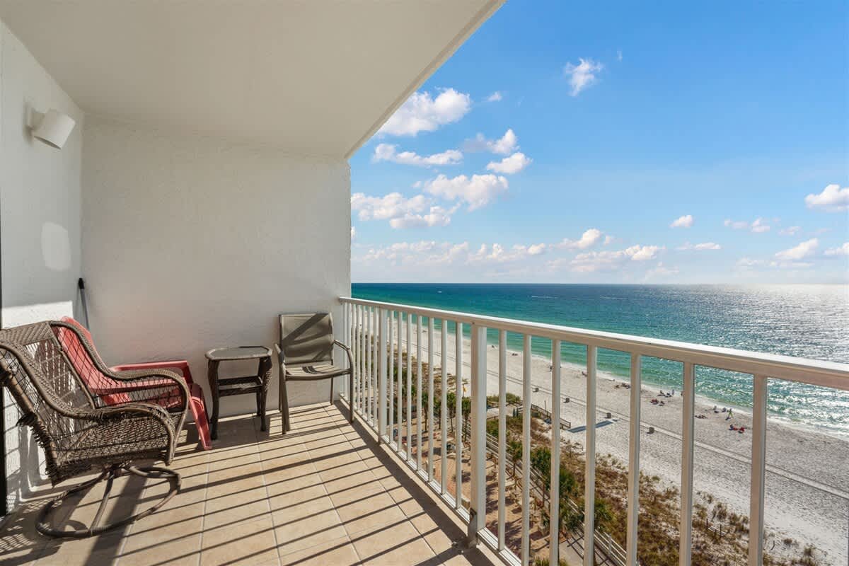 The Summit 1006 – Balcony with seating overlooking the beach and ocean view.