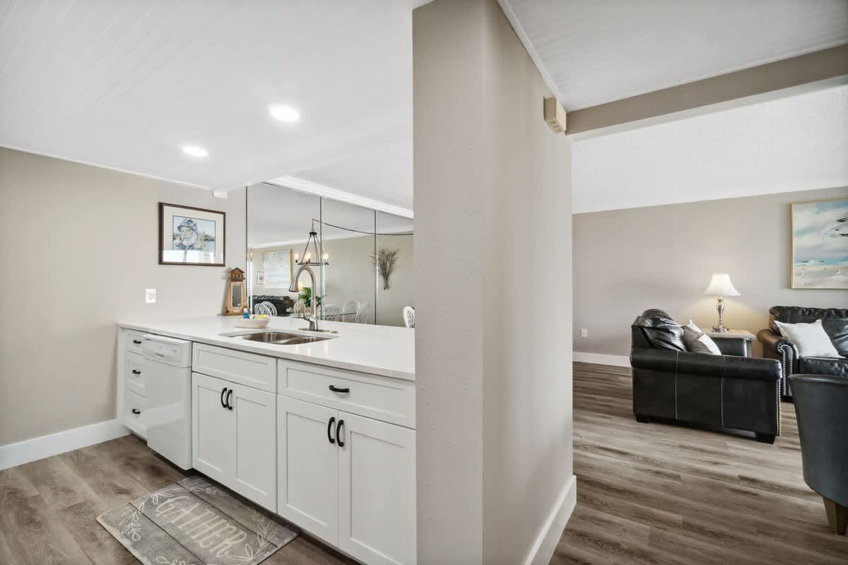 Moondrifter 502 – Open concept living area with a kitchen, dining space, and cozy seating area.