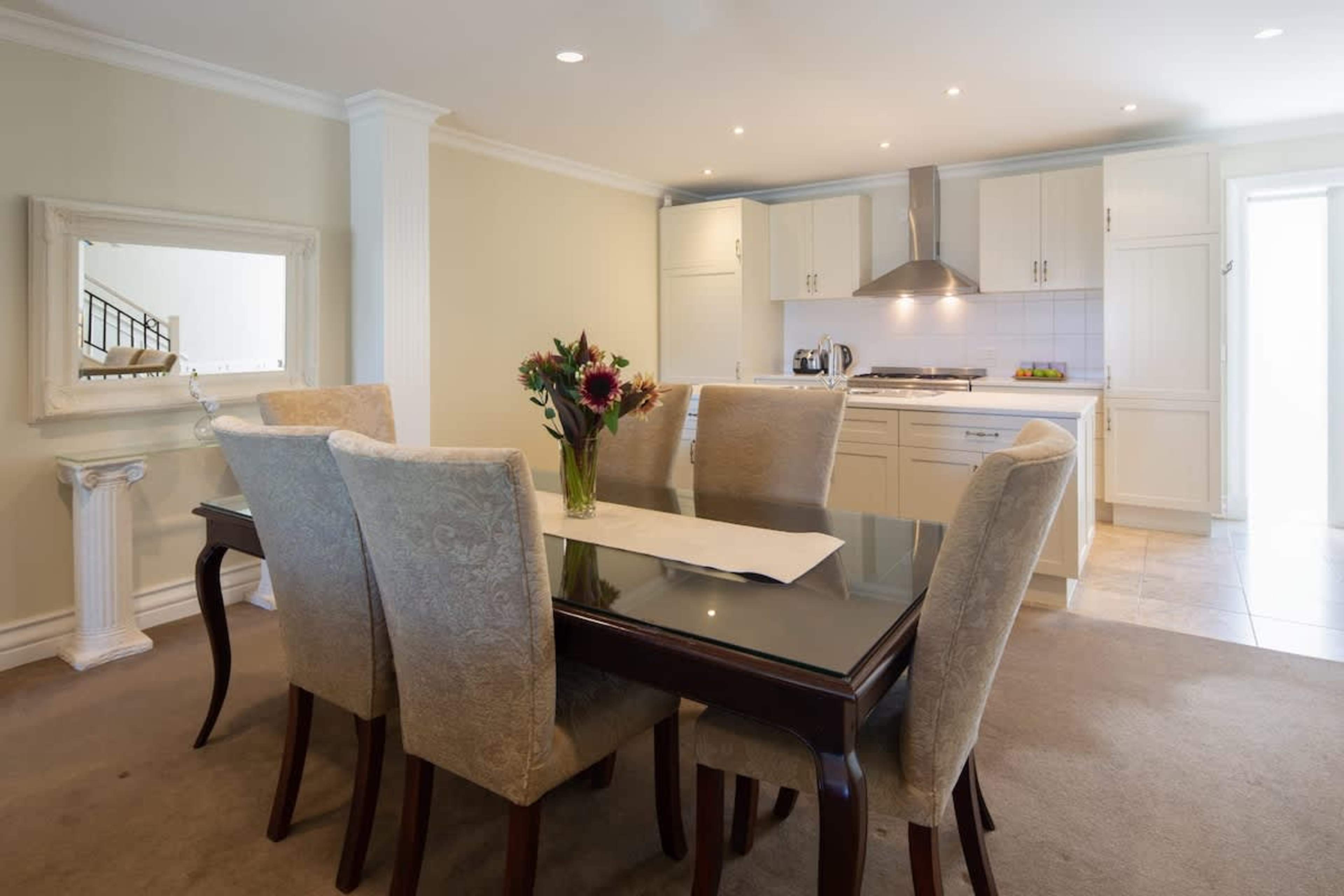 Lake-Inspired Dining
Dine in style in the contemporary dining area, where elegant furnishings and warm lighting create the perfect setting for memorable meals near the lake.