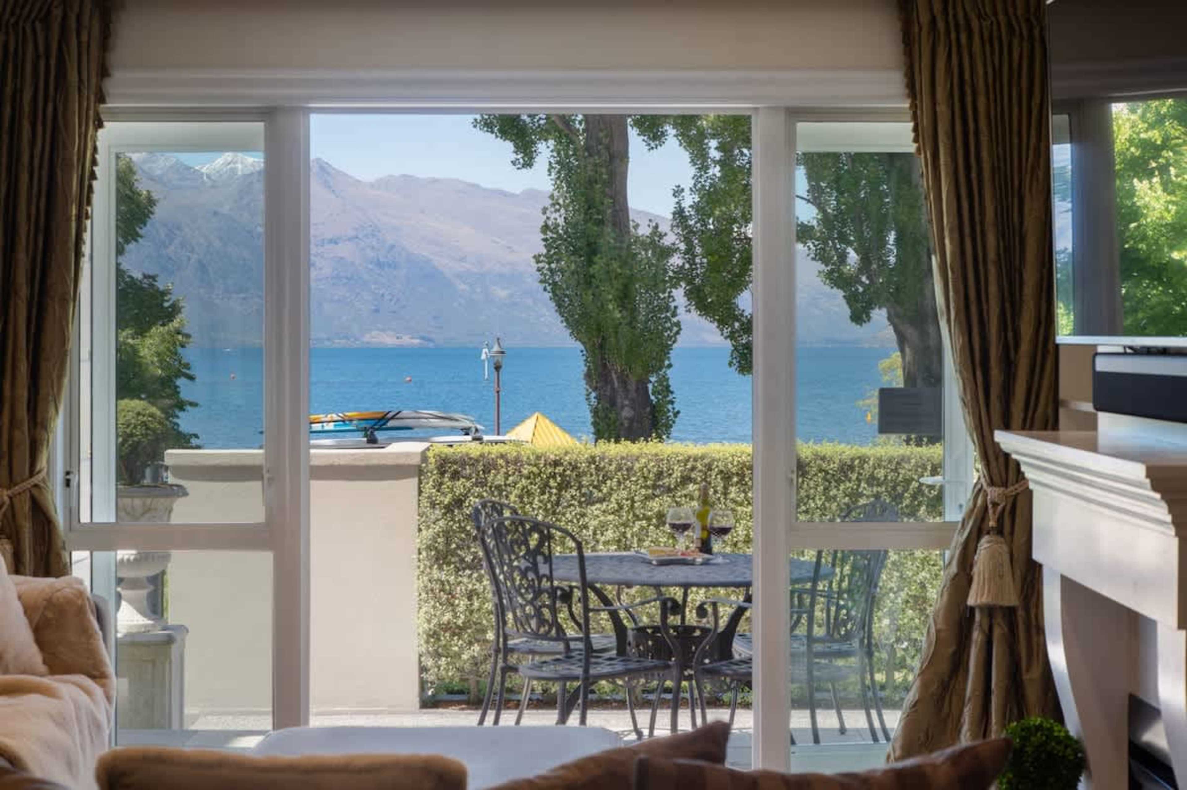 Family-Friendly Patio
Step out onto the patio for breathtaking lake vistas and easy access to the nearby kids' park, perfect for family fun and just a short walk to downtown Queenstown.