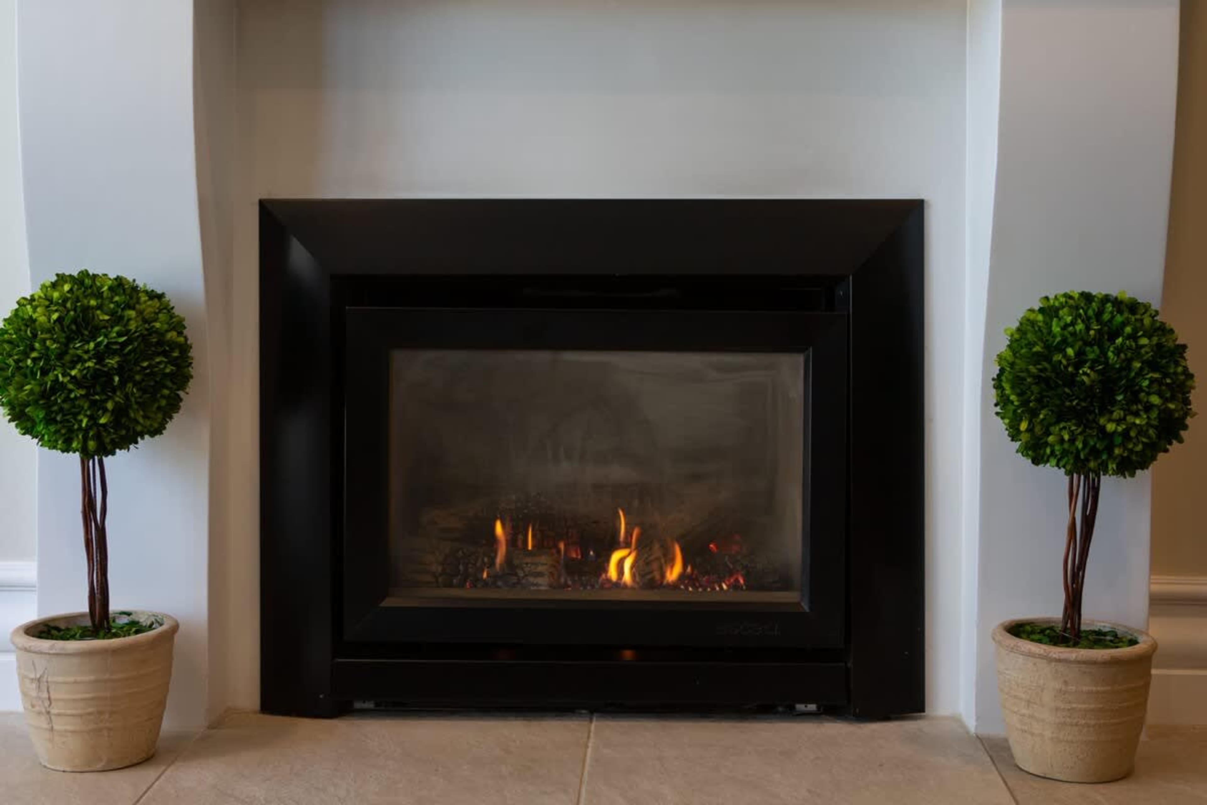 Lake-Inspired Living
Gather in the living room designed for comfort and style, with a gas fireplace providing warmth and charm, just steps from Queenstown's picturesque lake.
