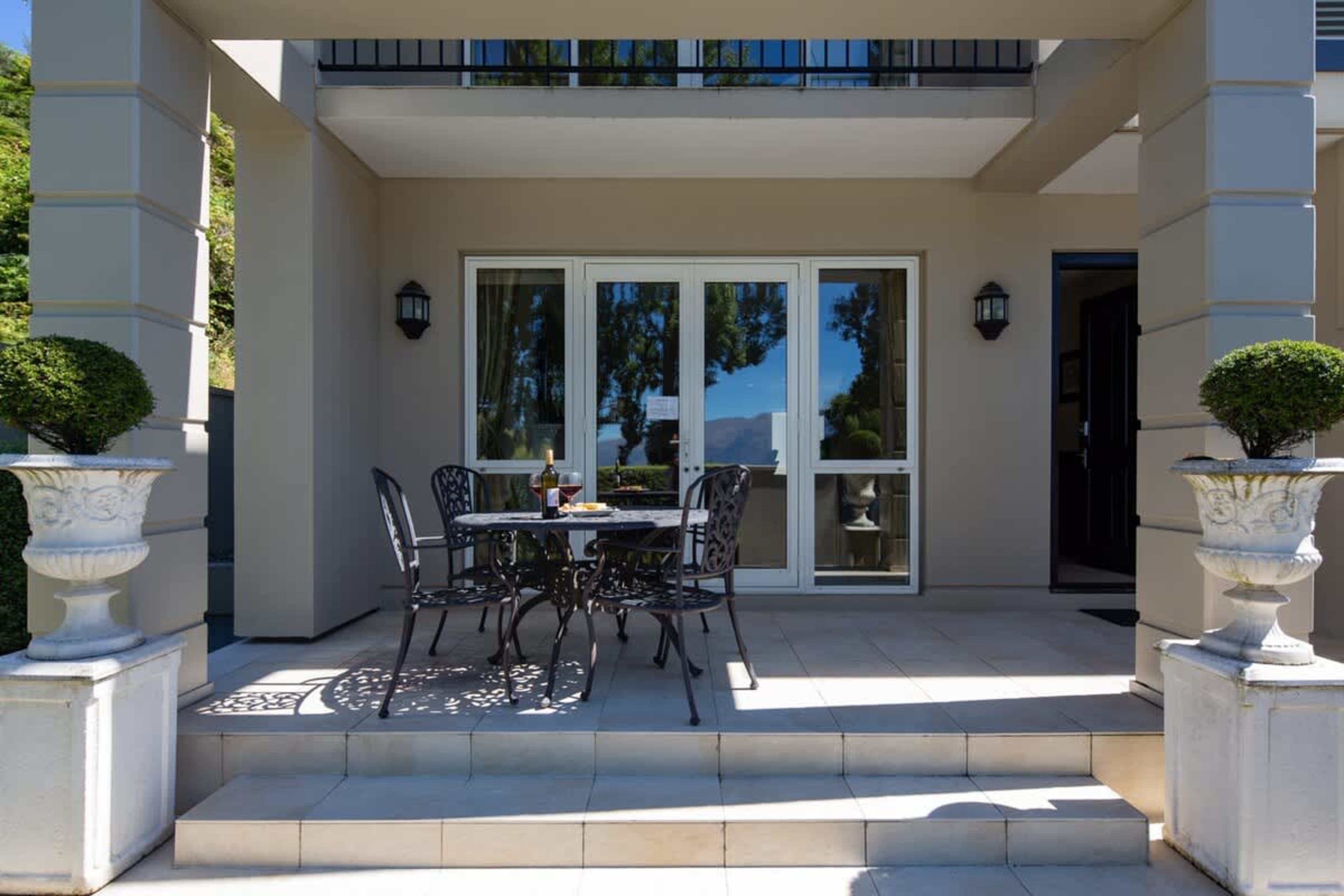 Lakeview Outdoor Space
Unwind on the patio, where lake views and the convenience of a kids' park across the street make it a perfect spot for families, all within walking distance to town.