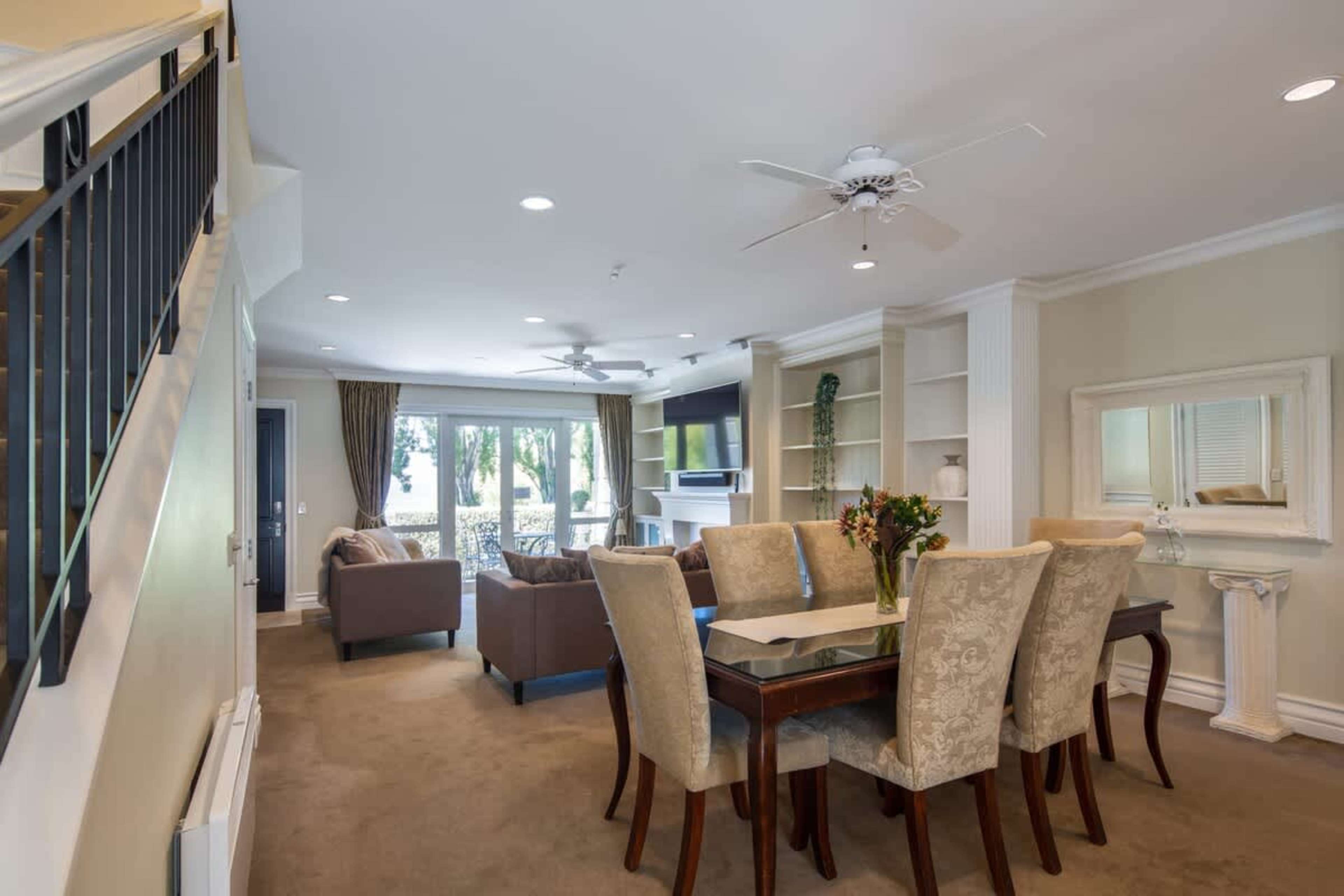 Bright and Inviting Dining Space
Gather around the dining table in this charming space, ideal for enjoying meals with loved ones after a day exploring Queenstown’s stunning lakefront.