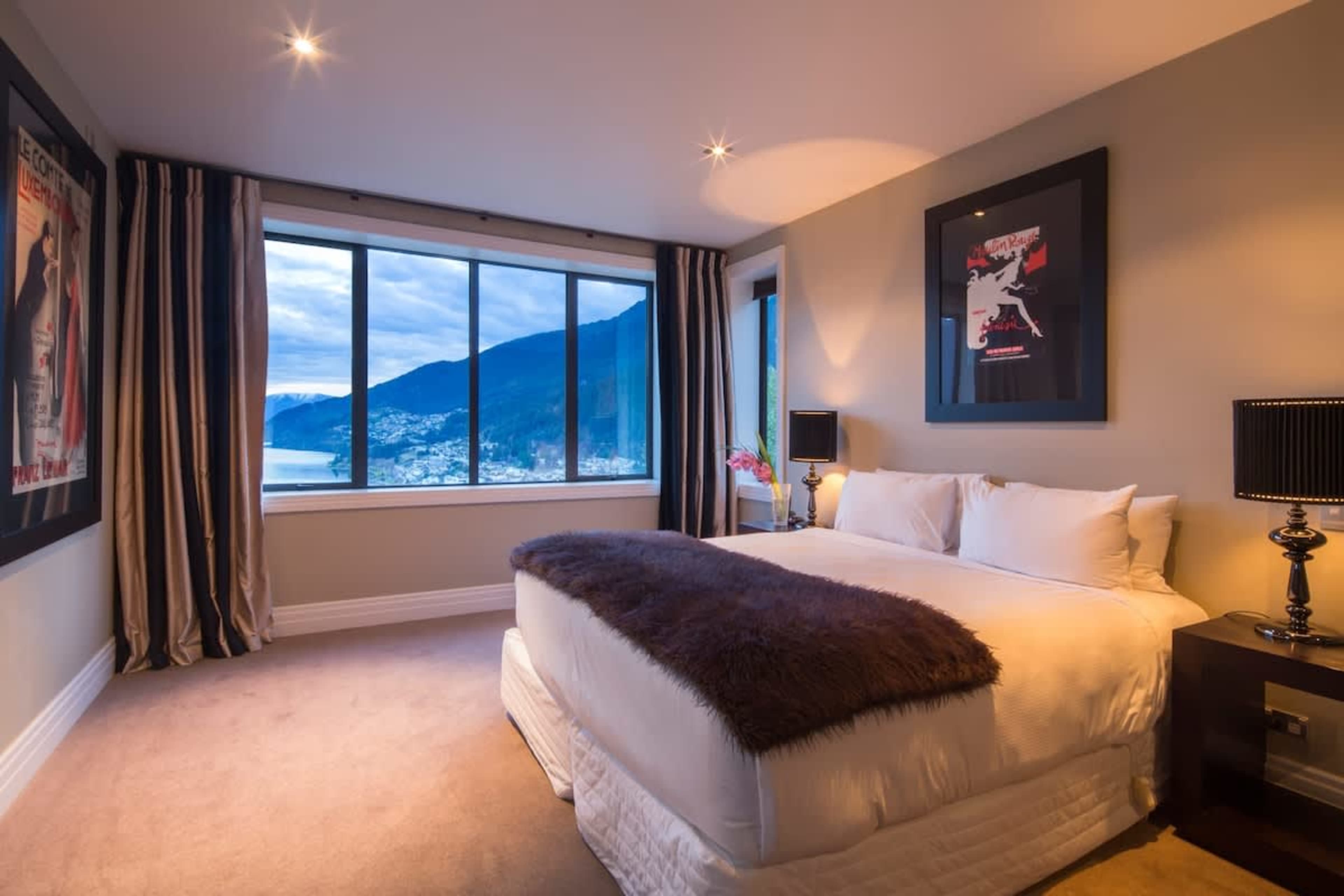 Luxury Retreat: The master bedroom features a brand-new bed dressed in premium linen, offering ultimate comfort and an ensuite for added convenience.