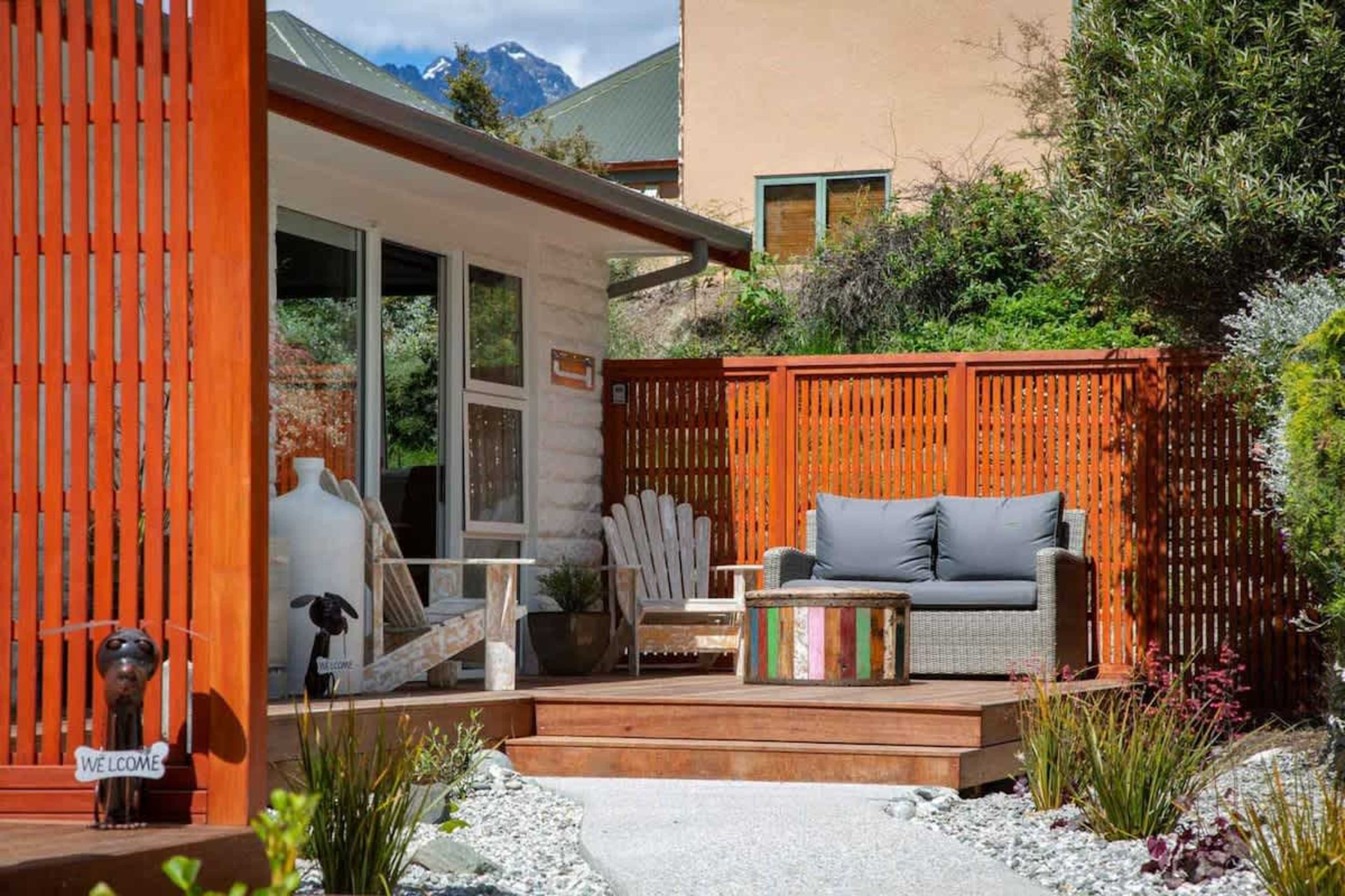 Sunny Patio with Outdoor Seating
Relax on the sunny patio with comfortable seating, perfect for enjoying your morning coffee or unwinding in the fresh air. It’s an inviting space to take in the surrounding views and enjoy outdoor living.