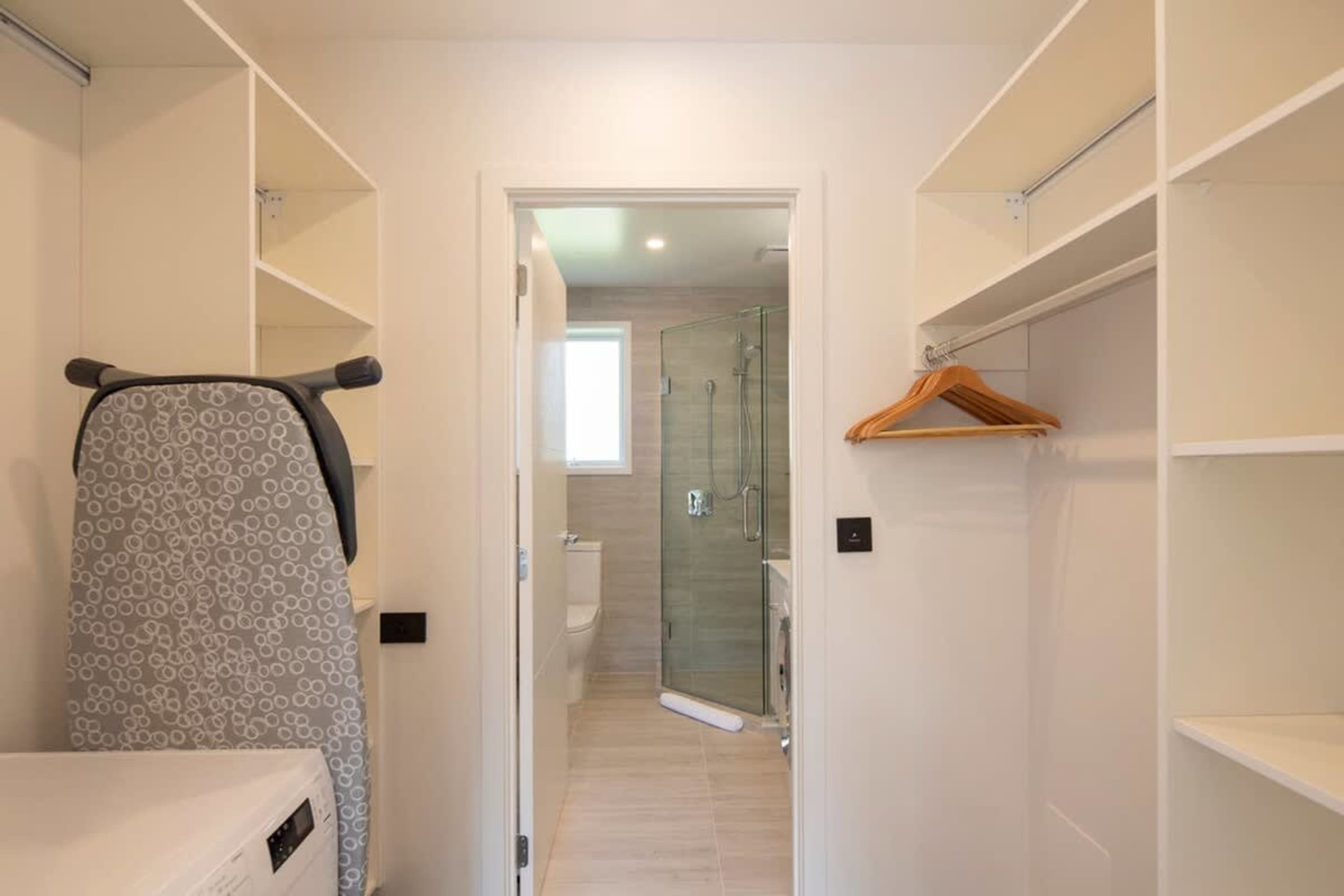 Master Bedroom with Queen Bed, Ensuite, and Walk-in Wardrobe
Relax in the master bedroom, complete with a queen bed, ensuite, and ample wardrobe space. Designed for comfort, it offers a private, peaceful space to unwind after a day of exploring.