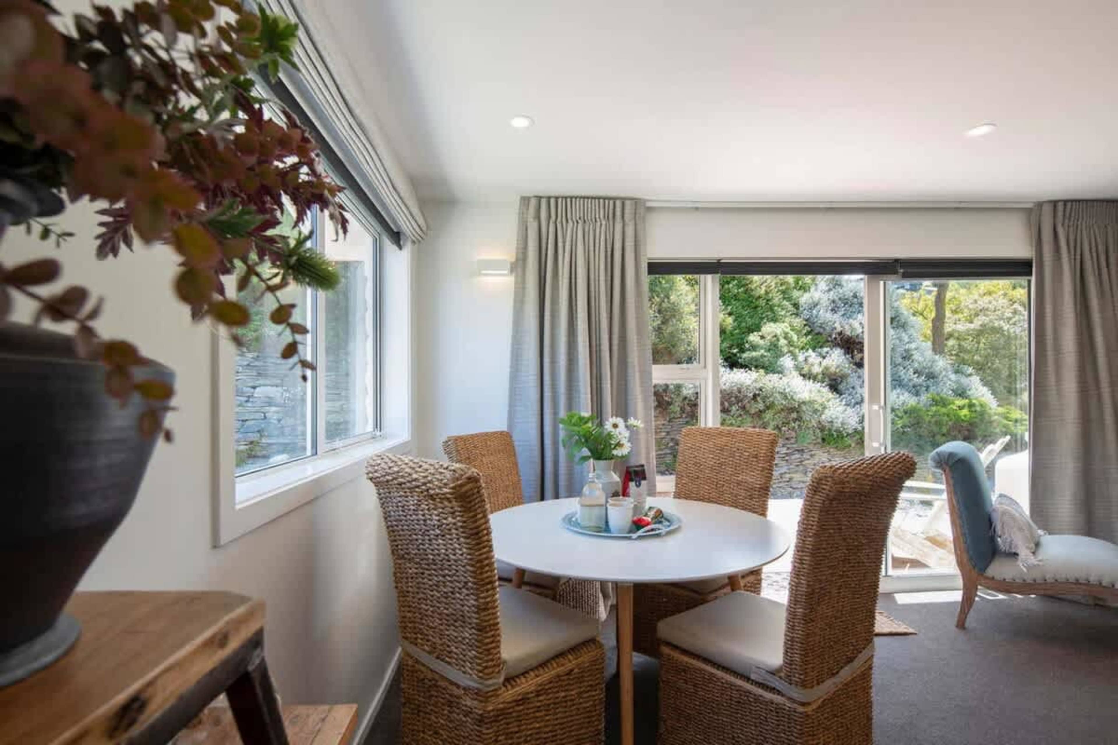 Bright Dining Area with Patio Connection
Enjoy meals in this inviting dining area with easy access to the outdoor patio. With plenty of space and natural light, it offers a seamless indoor-outdoor dining experience for relaxation and comfort.
