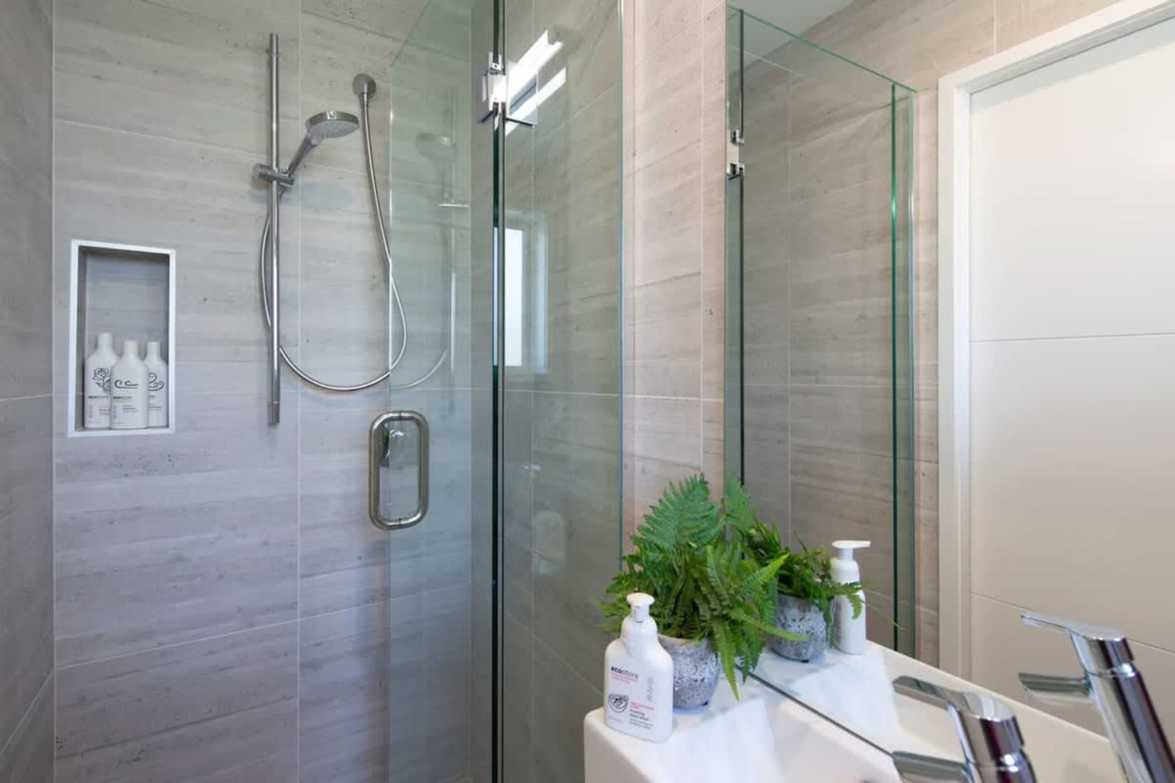 Private Ensuite with Walk-in Shower and Wardrobe
The ensuite for the second bedroom includes a walk-in shower and convenient access to the wardrobe. It’s designed for comfort and privacy, providing a peaceful retreat with all the essentials.