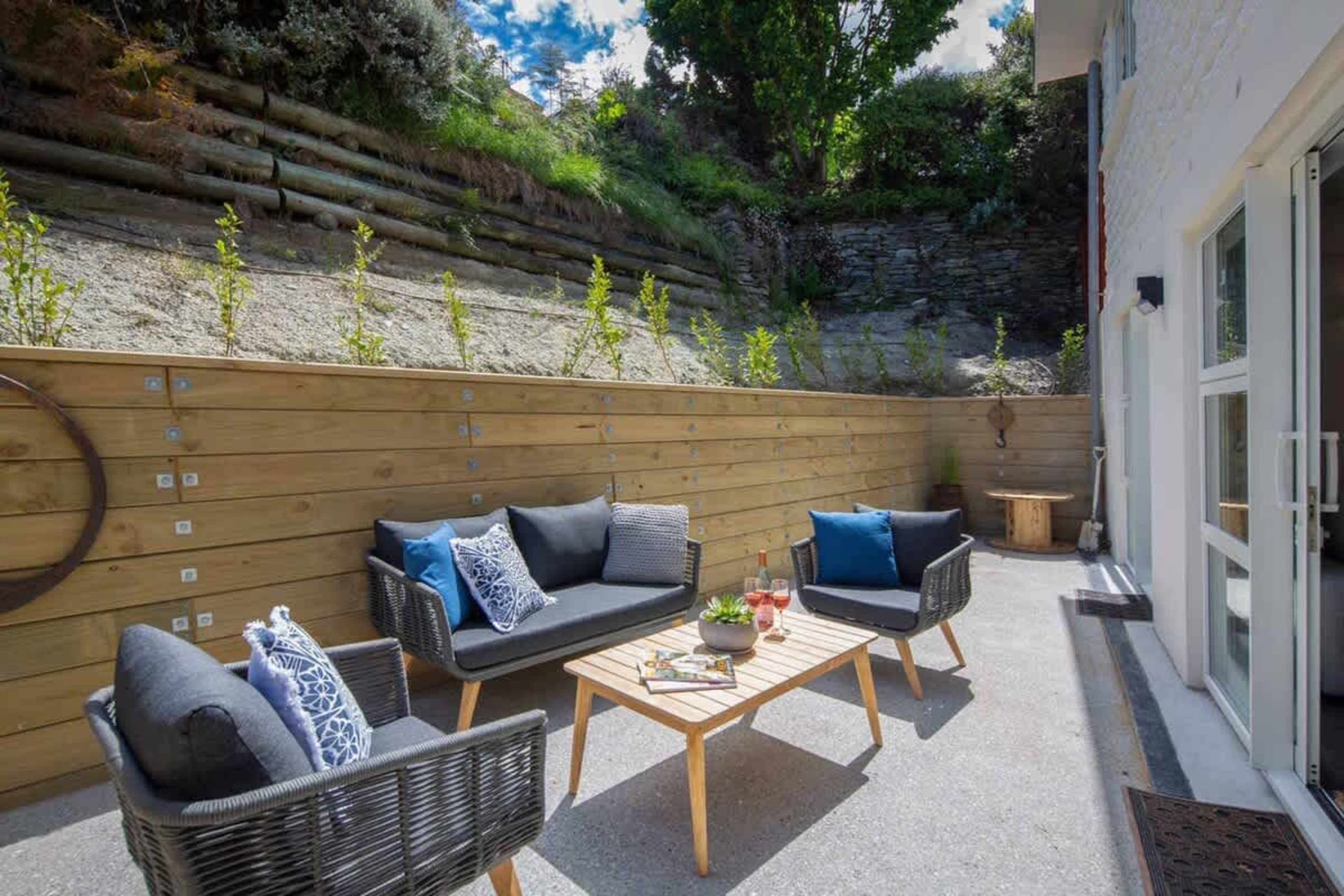 Sunny Patio with Comfortable Seating
Enjoy the outdoors on this spacious patio, featuring cozy seating and plenty of sunshine. It’s the perfect spot for morning coffee, relaxing, or dining al fresco while soaking in the serene surroundings.