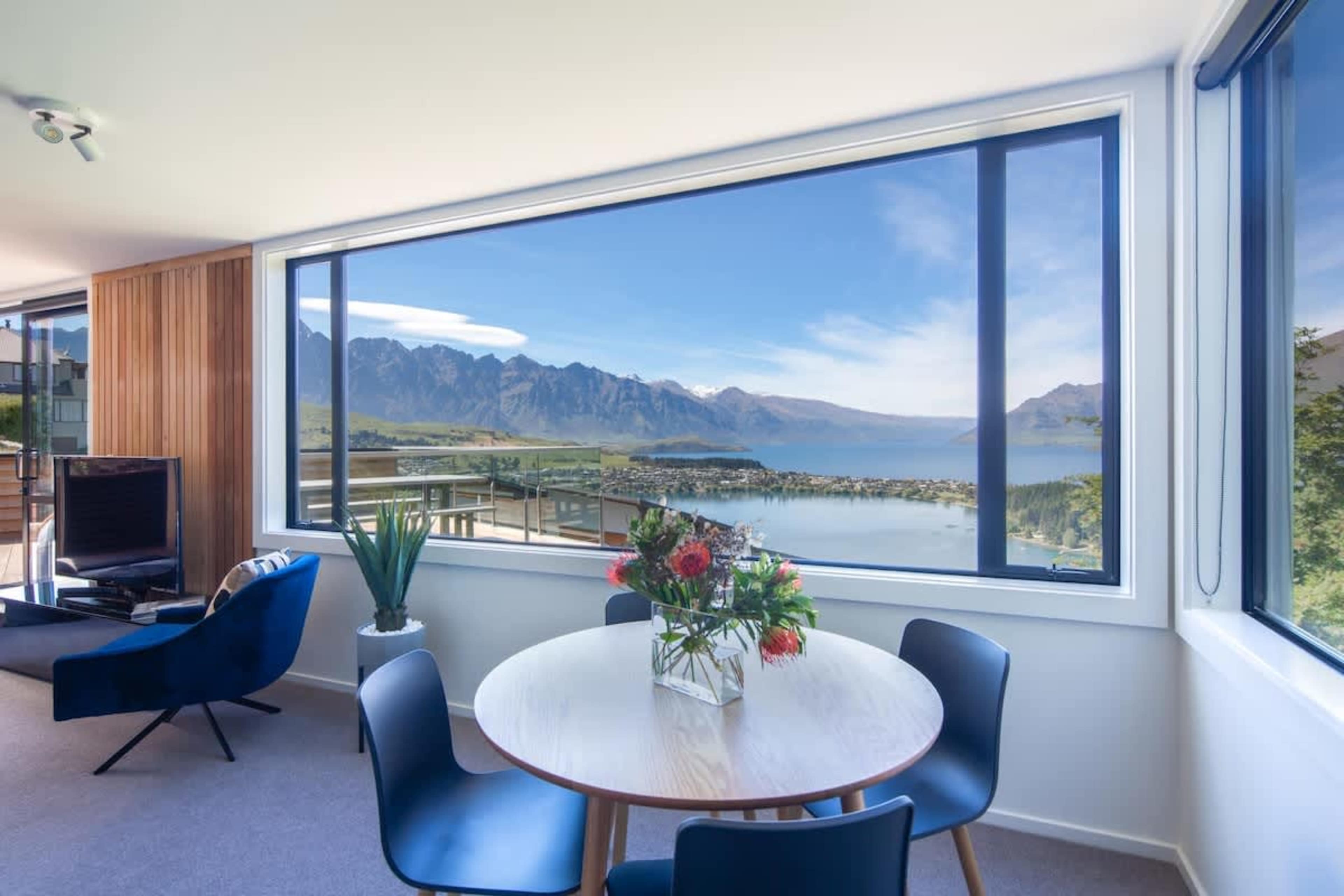 Charming Second Dining Room with Views
This cozy second dining room offers a large table and breathtaking views of Lake Wakatipu and the Remarkables. Perfect for intimate meals or gatherings, it combines comfort with scenic beauty.