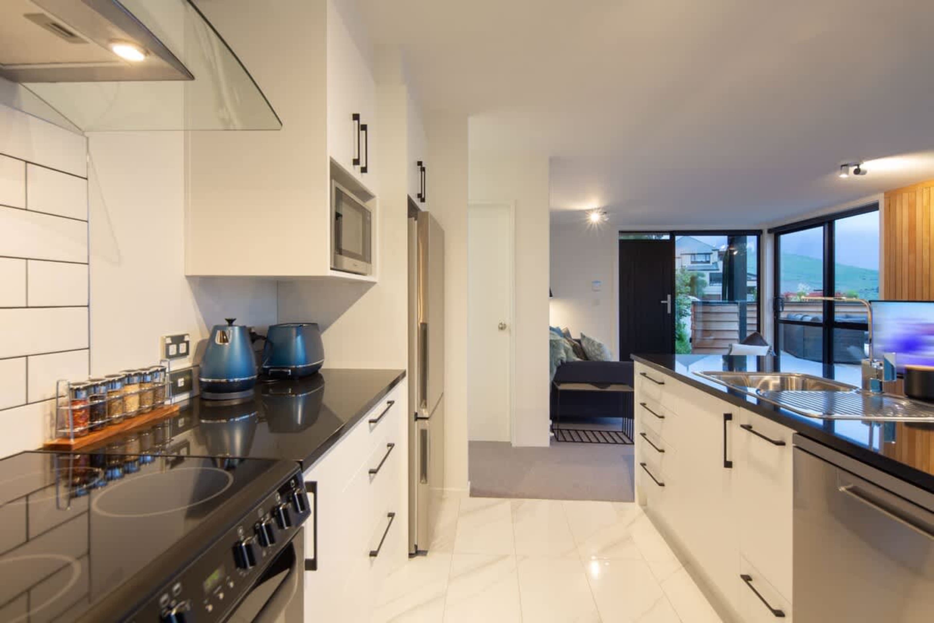 Cook up a storm in the second kitchen of your self-contained accommodation in Queenstown, NZ